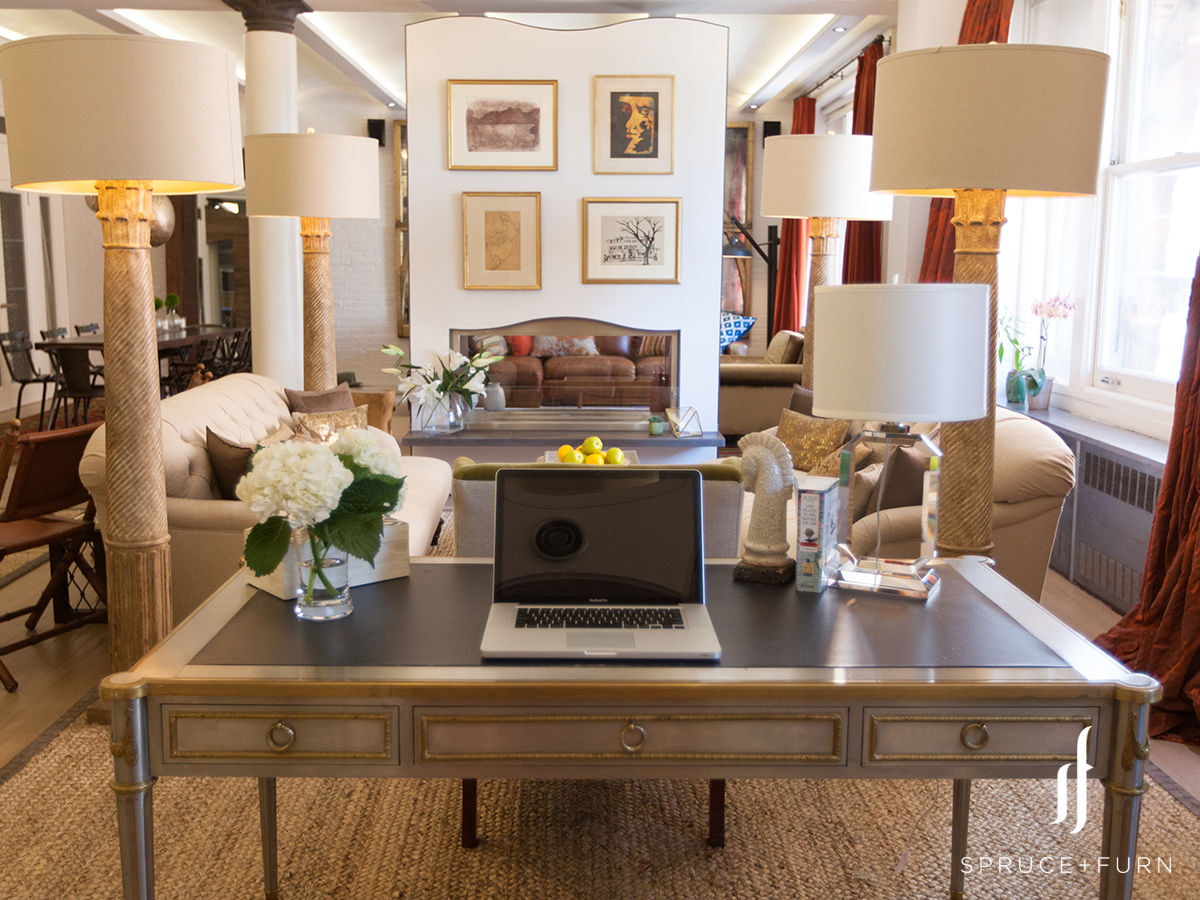 This lounge area has 4 large, column floor lamps positioned at each corner of the space which clearly distinguishes the space as unique. Photo credit: Steph Goralnick www.sgoralnick.com 