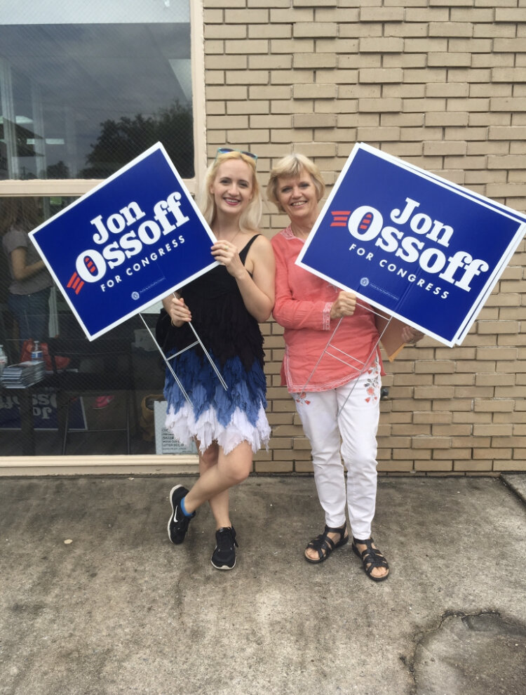 My Mom and I in 2017 when we went door to door handing out signs for Ossoff’s campaign.