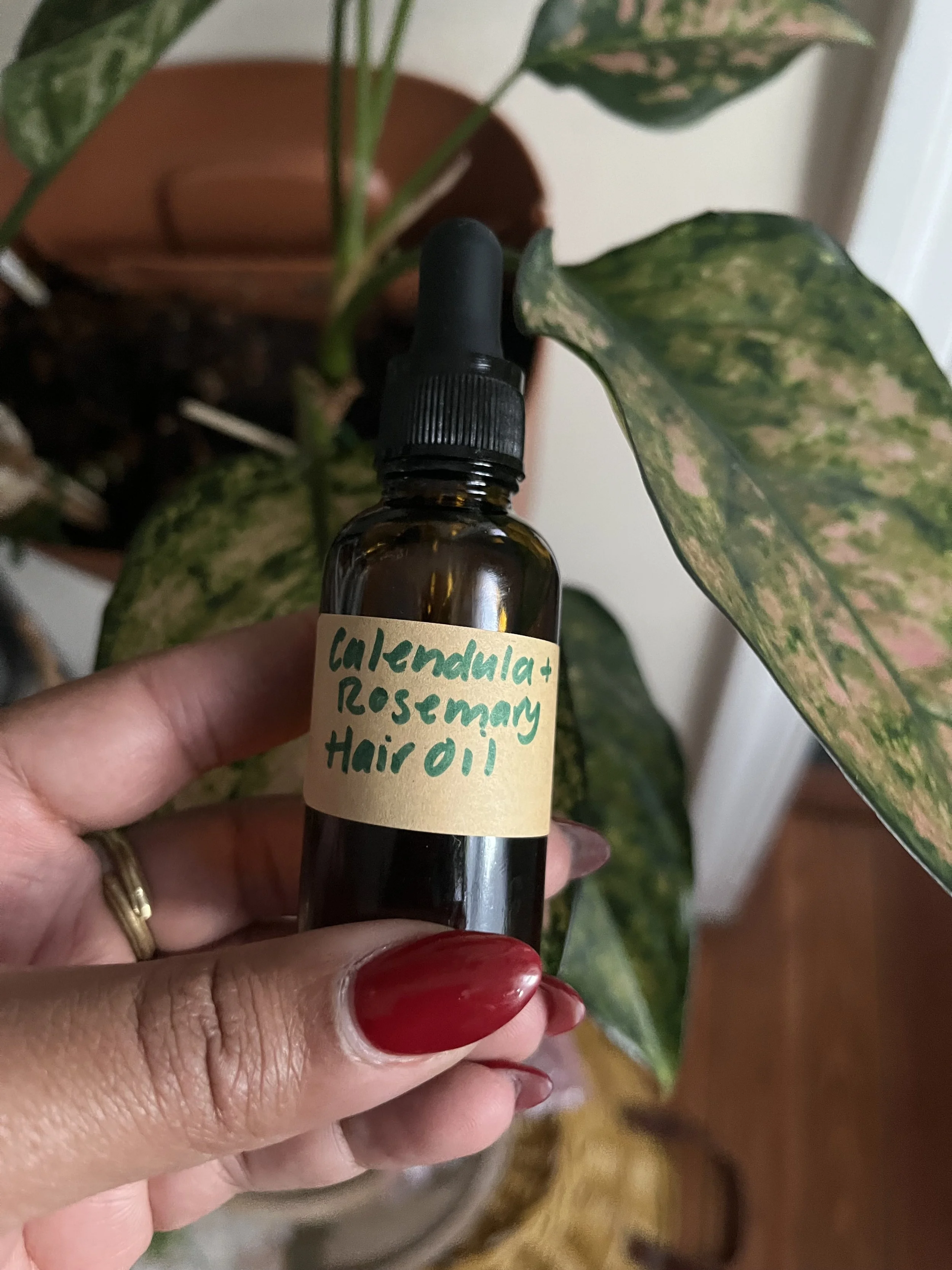 calendula and rosemary hair oil.JPEG