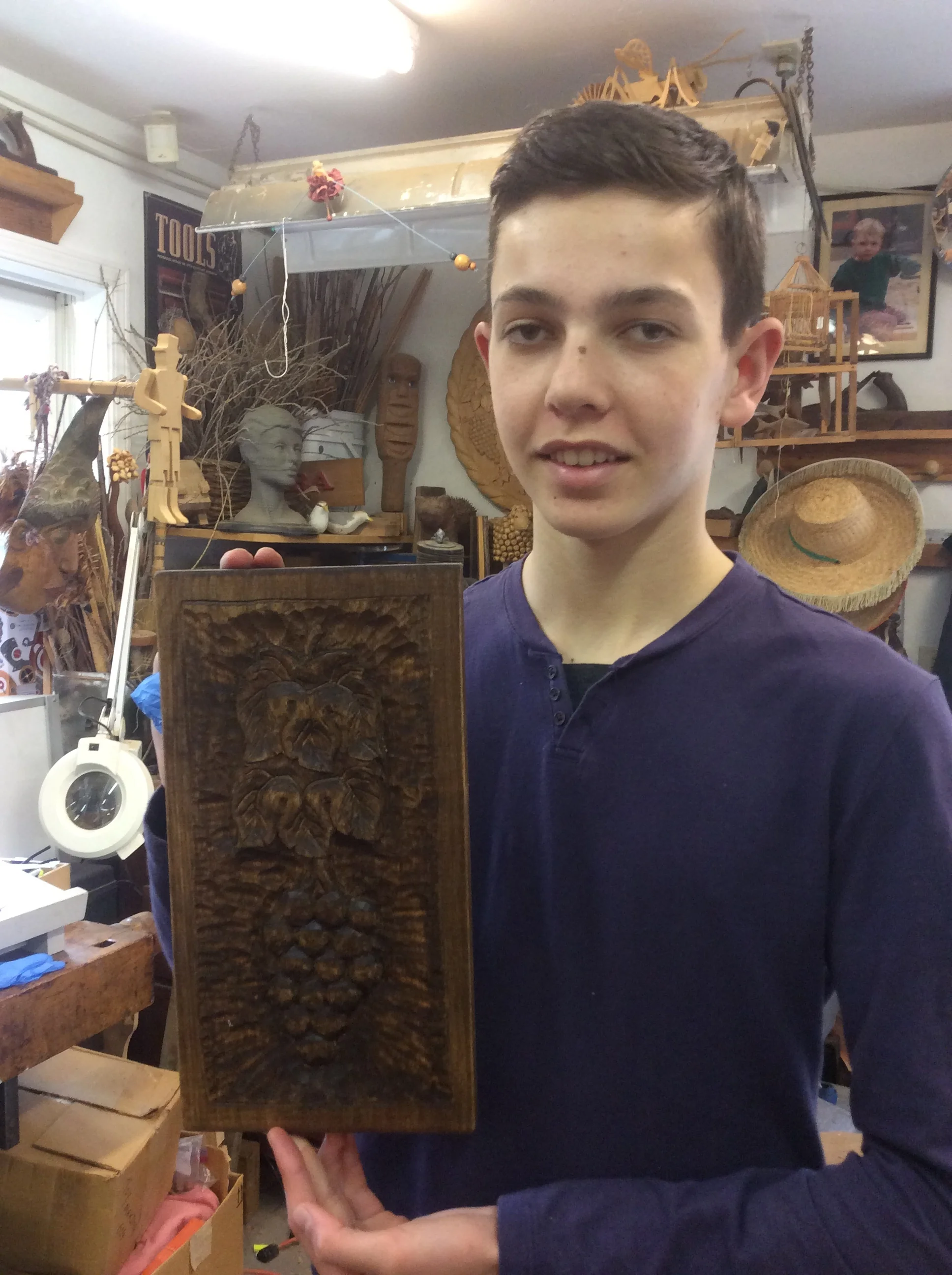 Sasha finished his grapes and leaves in two weeks. He is a natural at carving. 