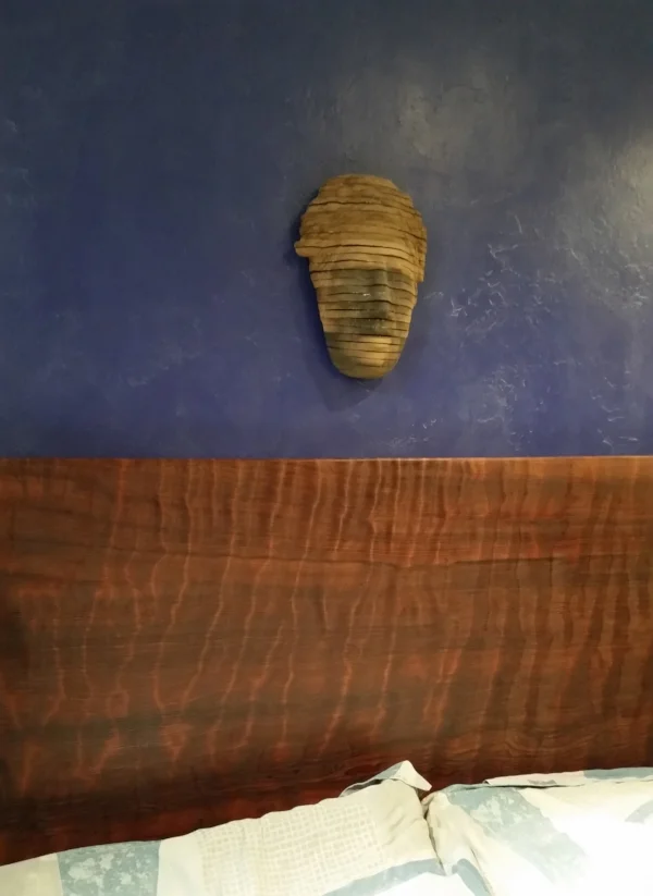 Another end of an era project. This gorgeous 52" x 58" x 2.5" piece of old growth ripple grain Redwood used to be a dusty, scratched lunch room table at the cabinet shop. After lots of sanding and scraping it now has a new life as my headboard. Makes me smile. 