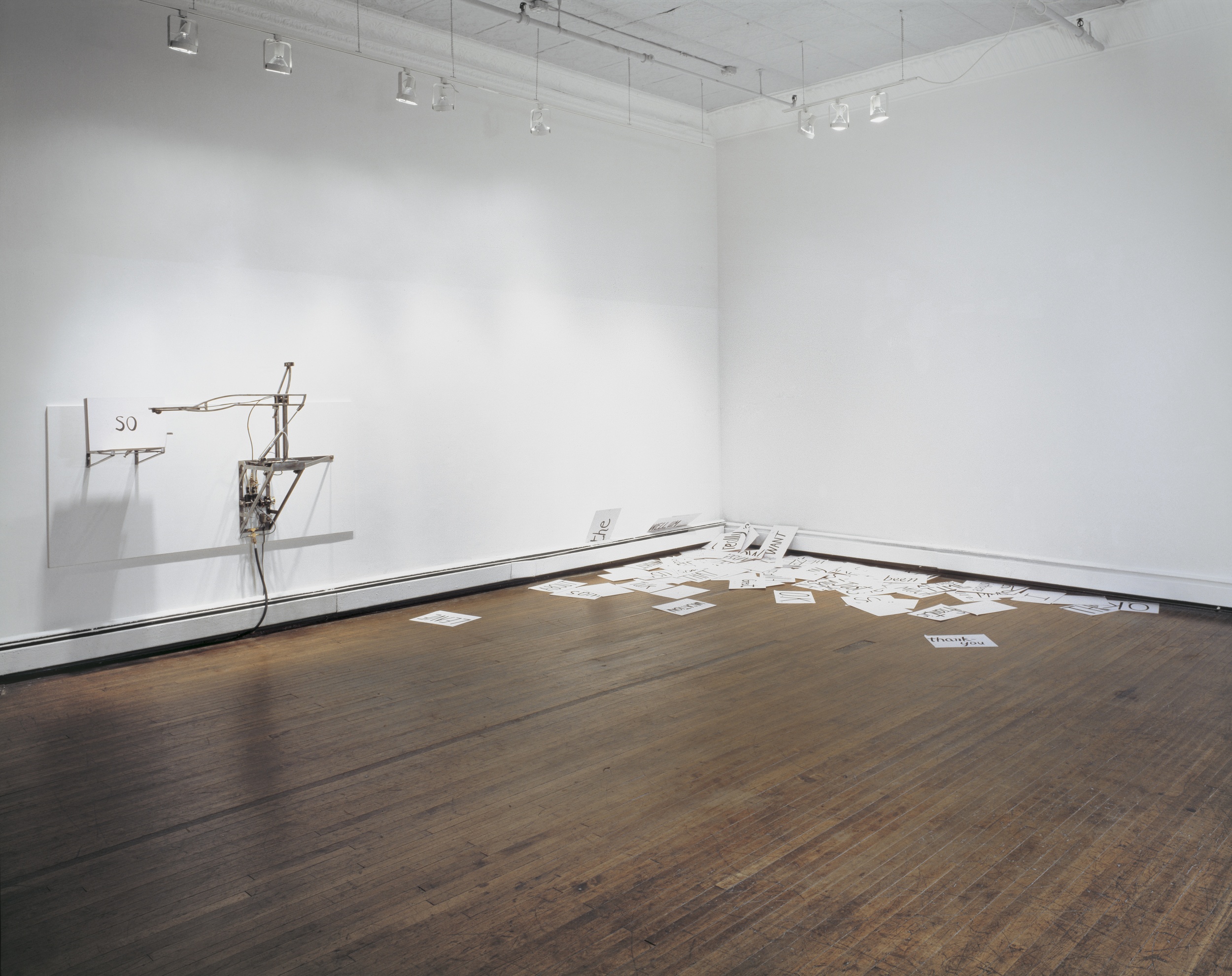  Placard Flinger, 1995, Steel, pneumatics, rubber, motor, and ink on cardboard, 48 x 60 x 24 inches 