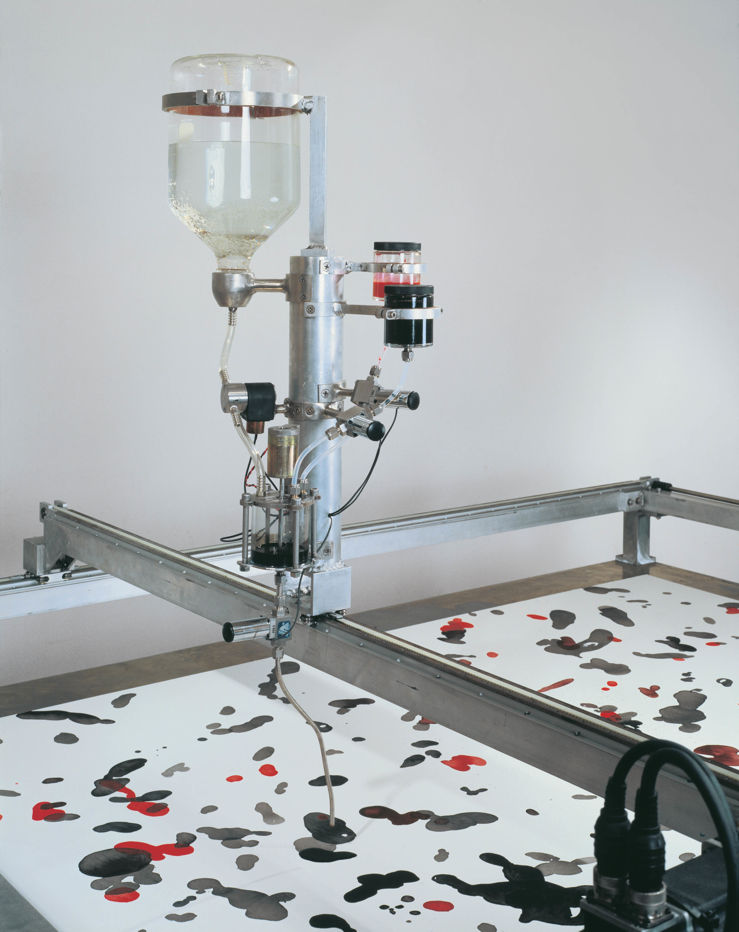   Drawing Machine, 2001,&nbsp;Aluminum, stainless steel, glass, valve, servo motors, track, computer, custom software, bearing, ink, and paper,&nbsp;92 x 94 x 94 inches  