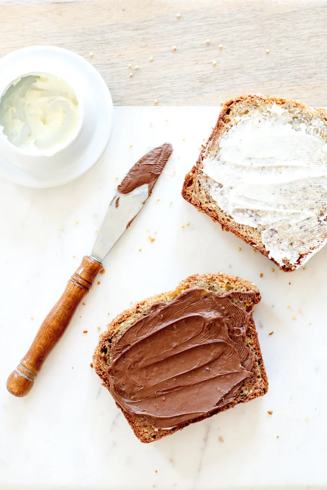 banana bread with toasted millet and butter or nutella