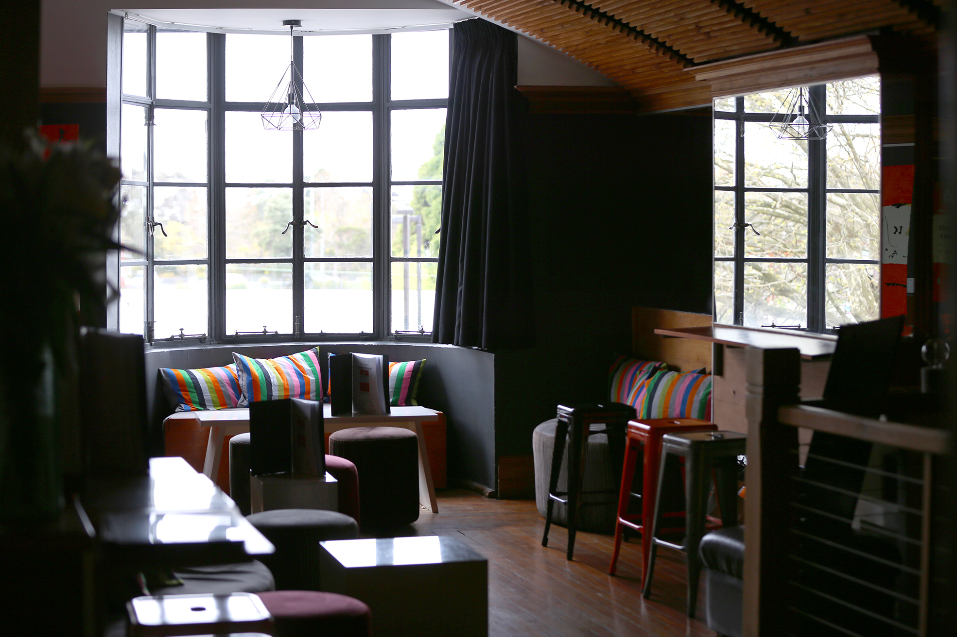 Upstairs at Palette Dining with huge windows overlooking the street below.