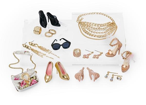 Accessories of A Doll's Life Vanessa Perrin doll: three pairs of shoes, sunglasses, embroidered bag with chain strap, chain long earrings, cross earrings, bracelets, pearl drop earrings, cuffs