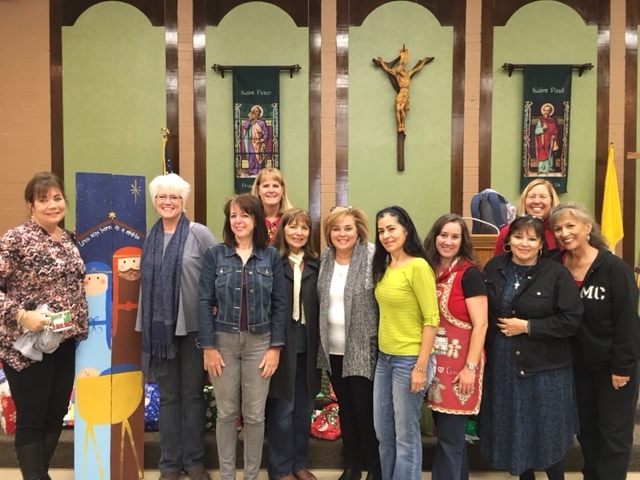 Mary is the sixth from the right