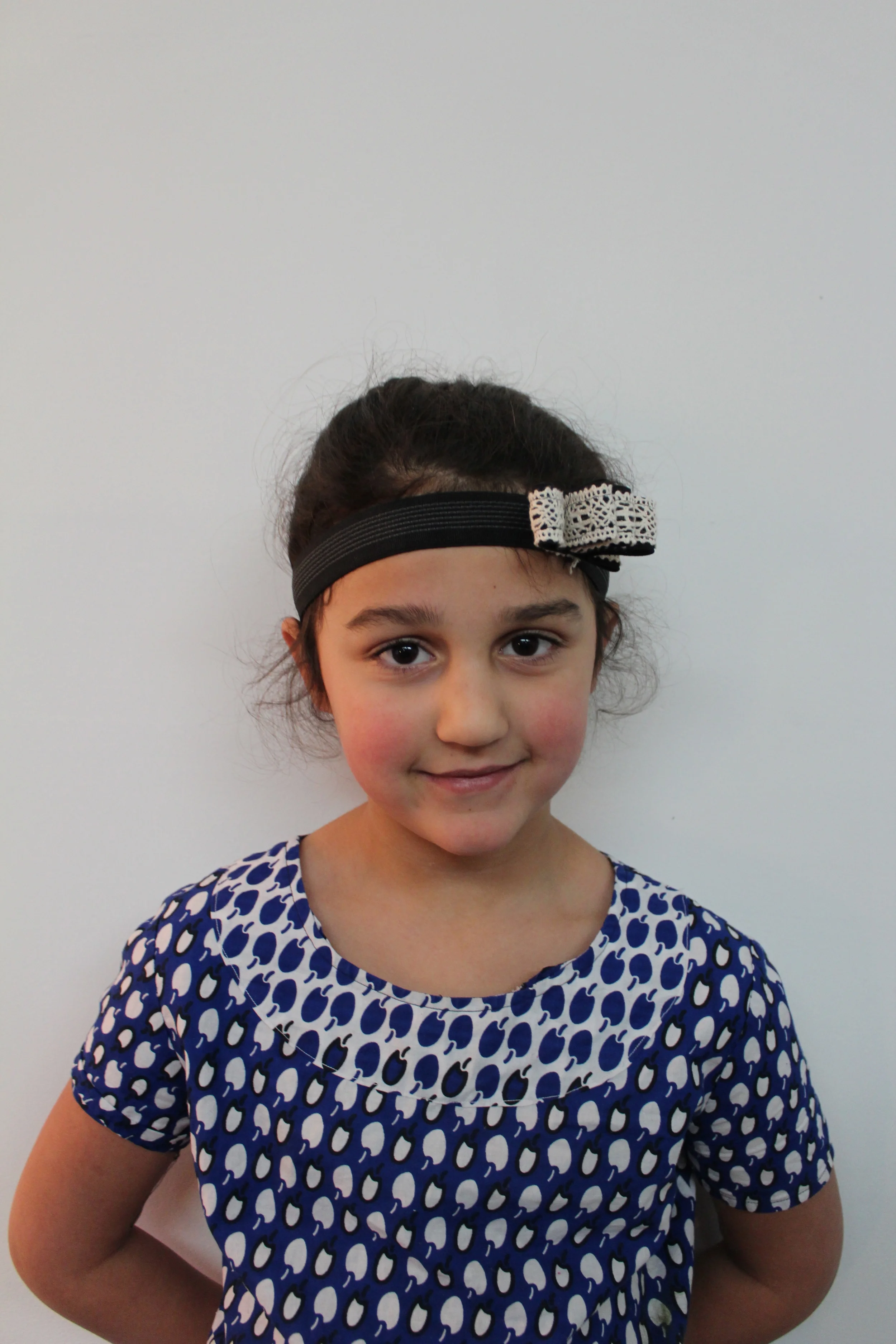 This artist designed and made, with her mom, an awesome headband - lace and elastic!