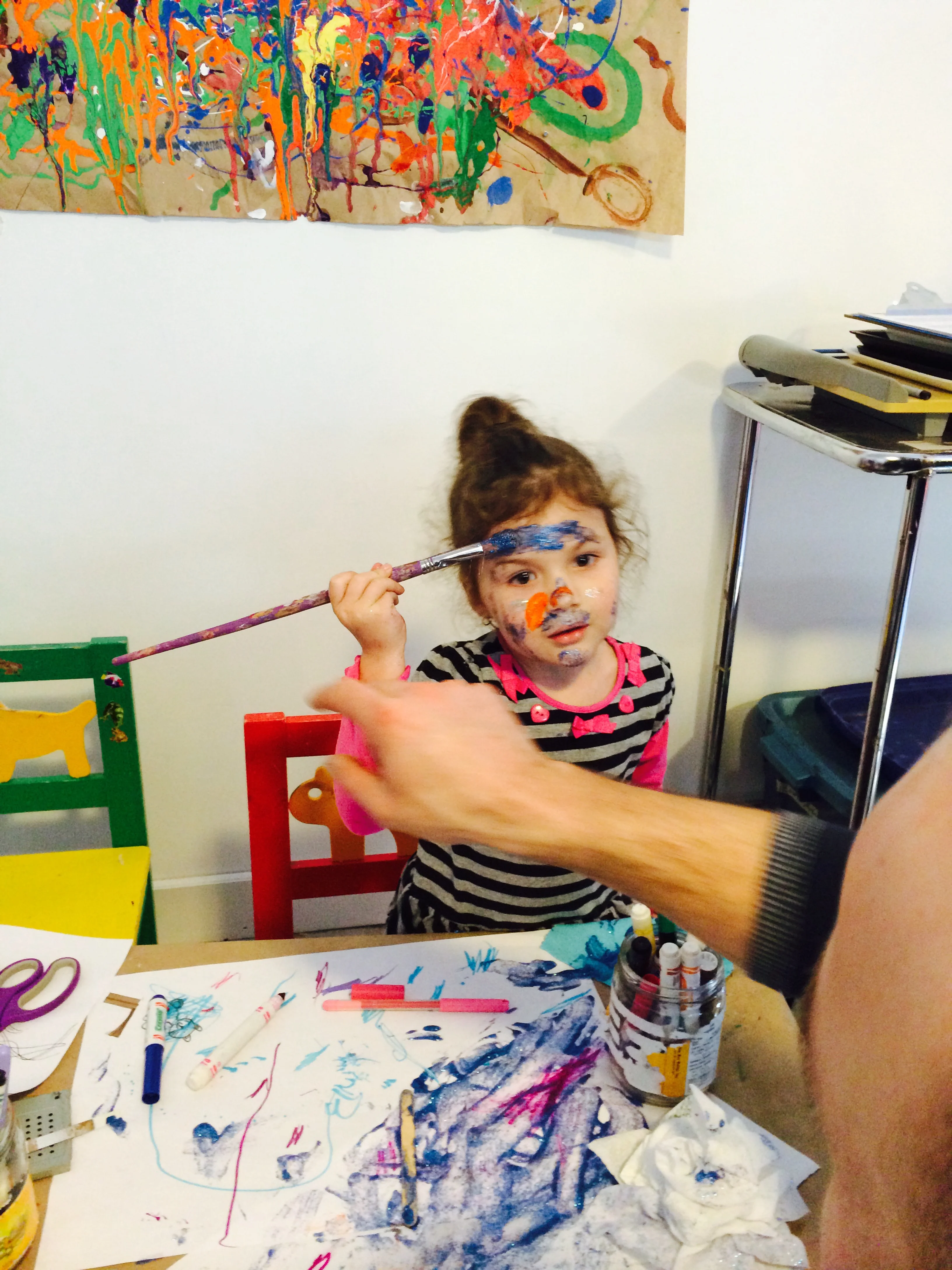An expressive canvas! Who can resist glitter and paint?