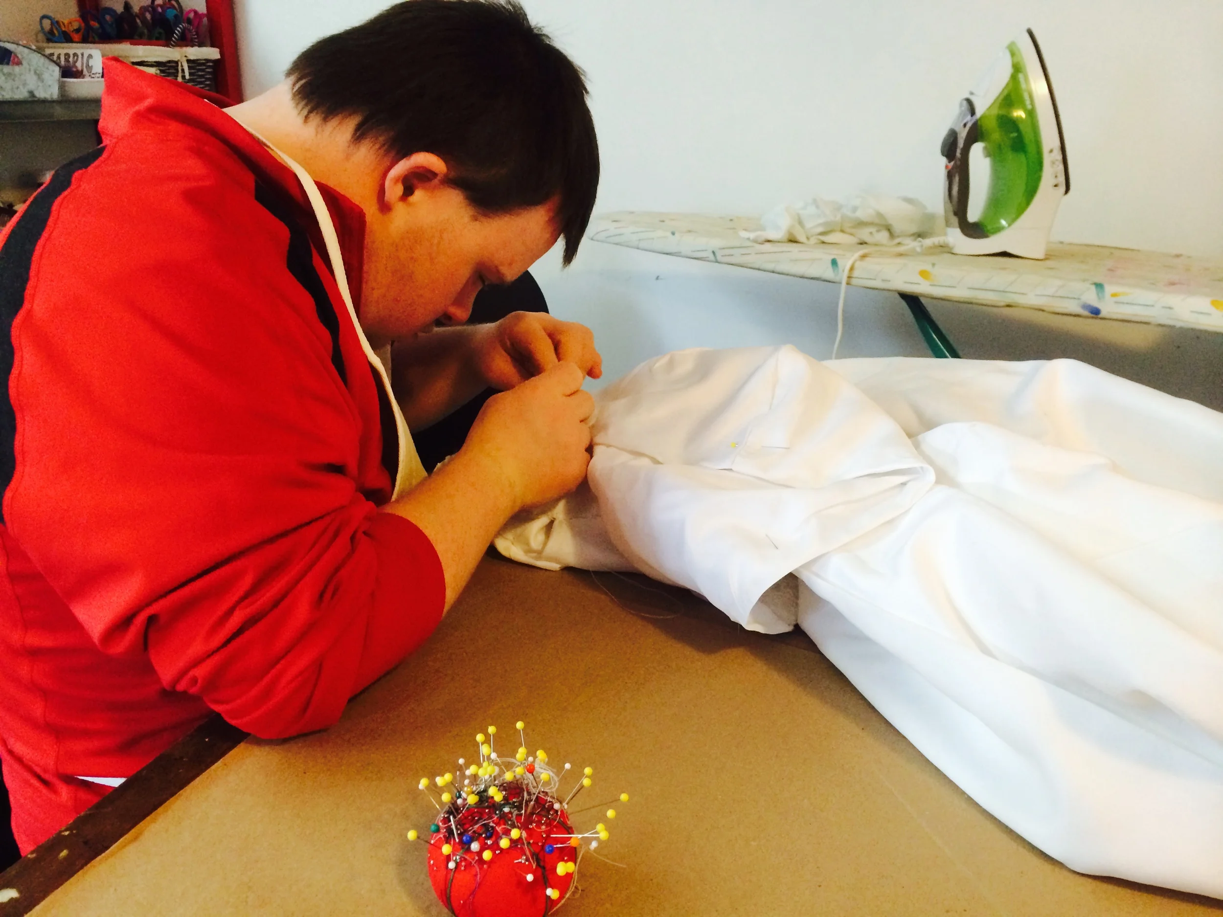The incredible wedding dress/cape being sewn by hand again this week. 