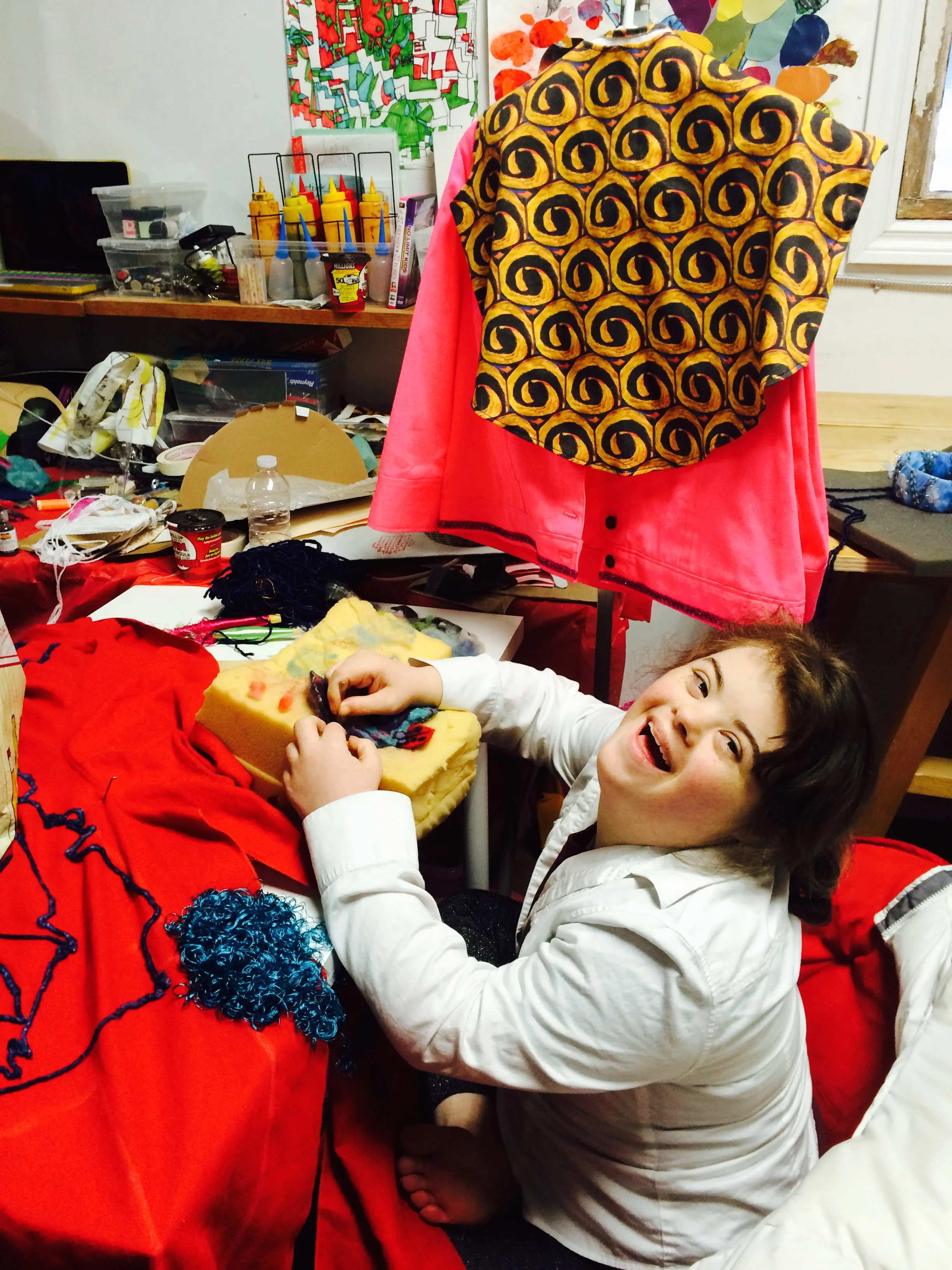 Just outside of Open Studio, one of our Wonder'neath artists diligently at work on Wearable Art Show fashion!