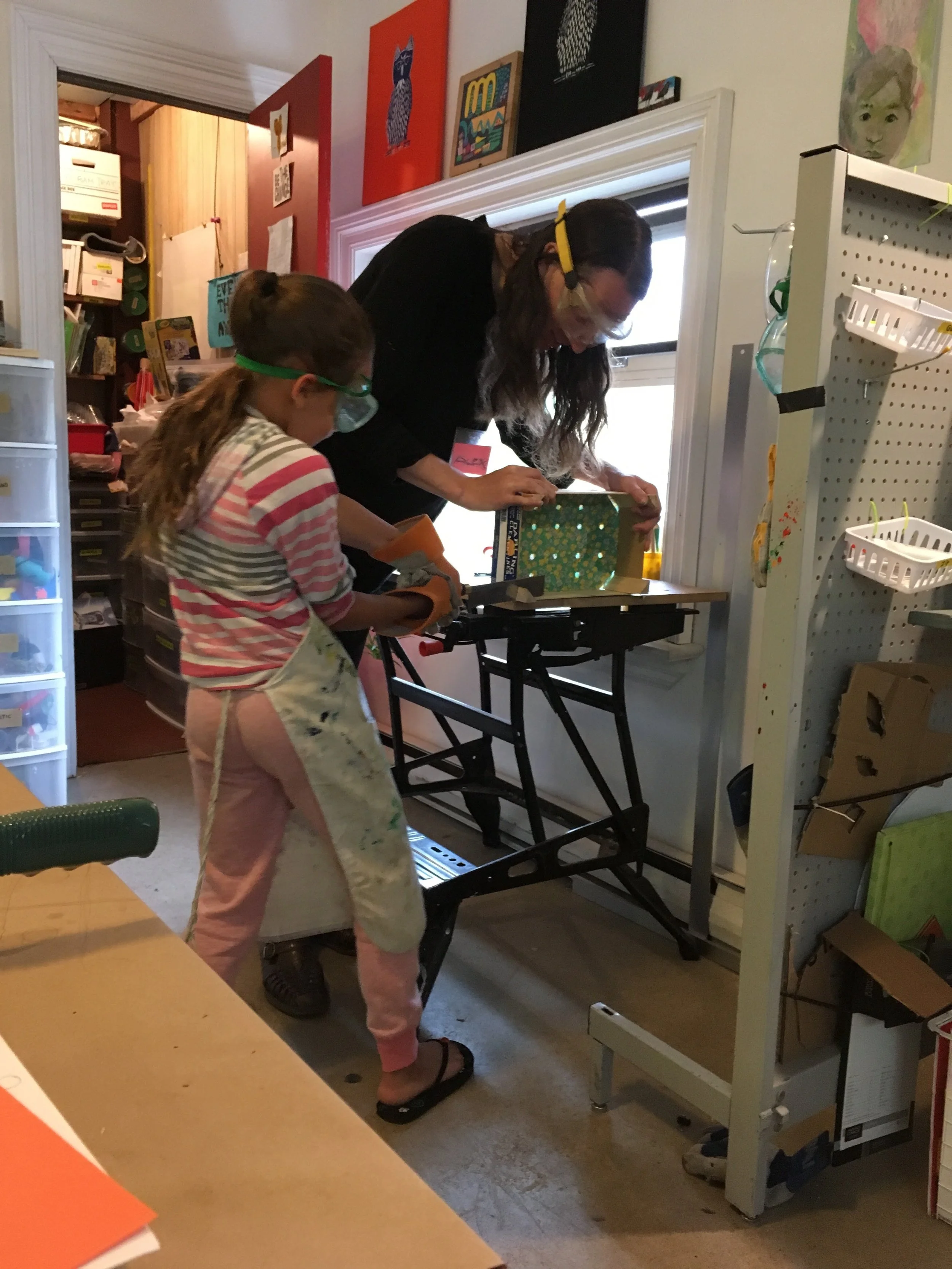 Testing out the new tools! We now have a range of small saws to cut wood, plastic, and metal.