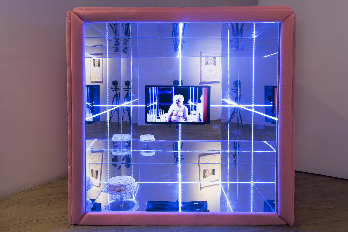   The Confectionery   Mirrored acrylic, wood, LED strips, velvet, rhinestone buttons, cake, glass cake stand, TV  5’x5’x4’     Banquet   Single-channel video  Runtime 2:26 