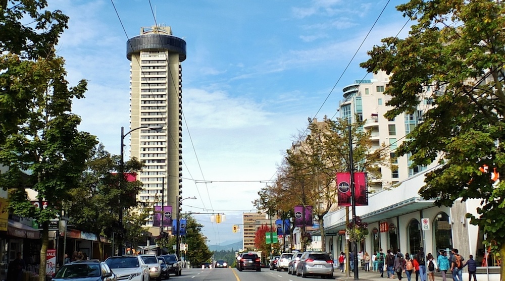 A recent photo of the Landmark towering over Robson Street.