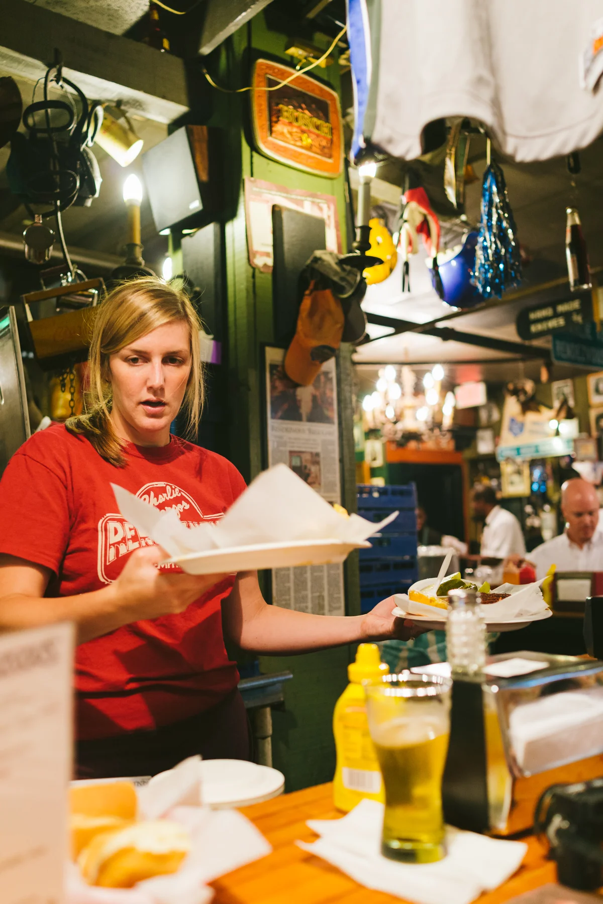 Eating at the bar in Charles Vergo's Rendezvous barbecue restaurant in Memphis, Tennessee.