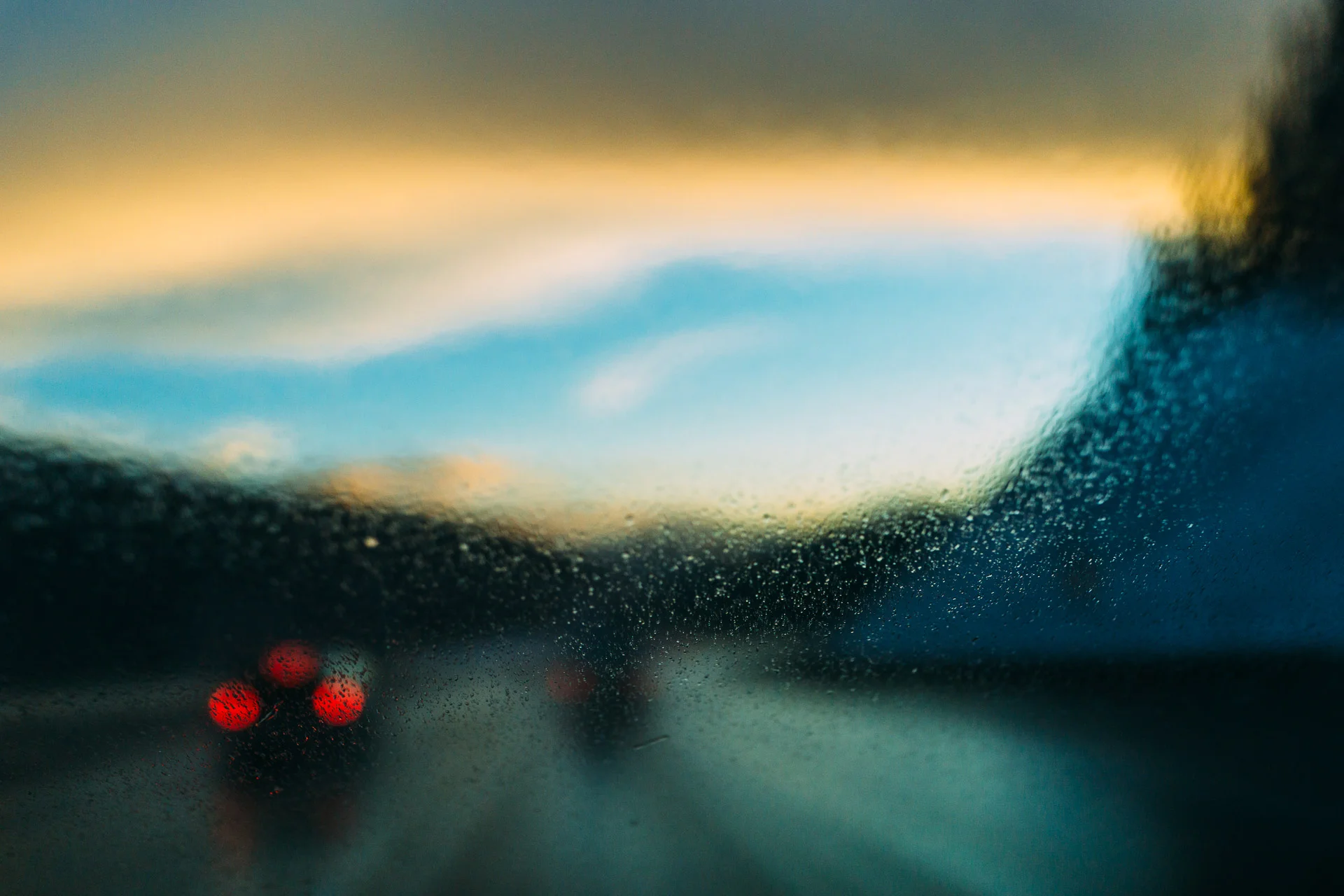A U-Haul journey across the Rocky Mountains in Colorado. Rain, then snow, then rain, then night (Sony RX1).