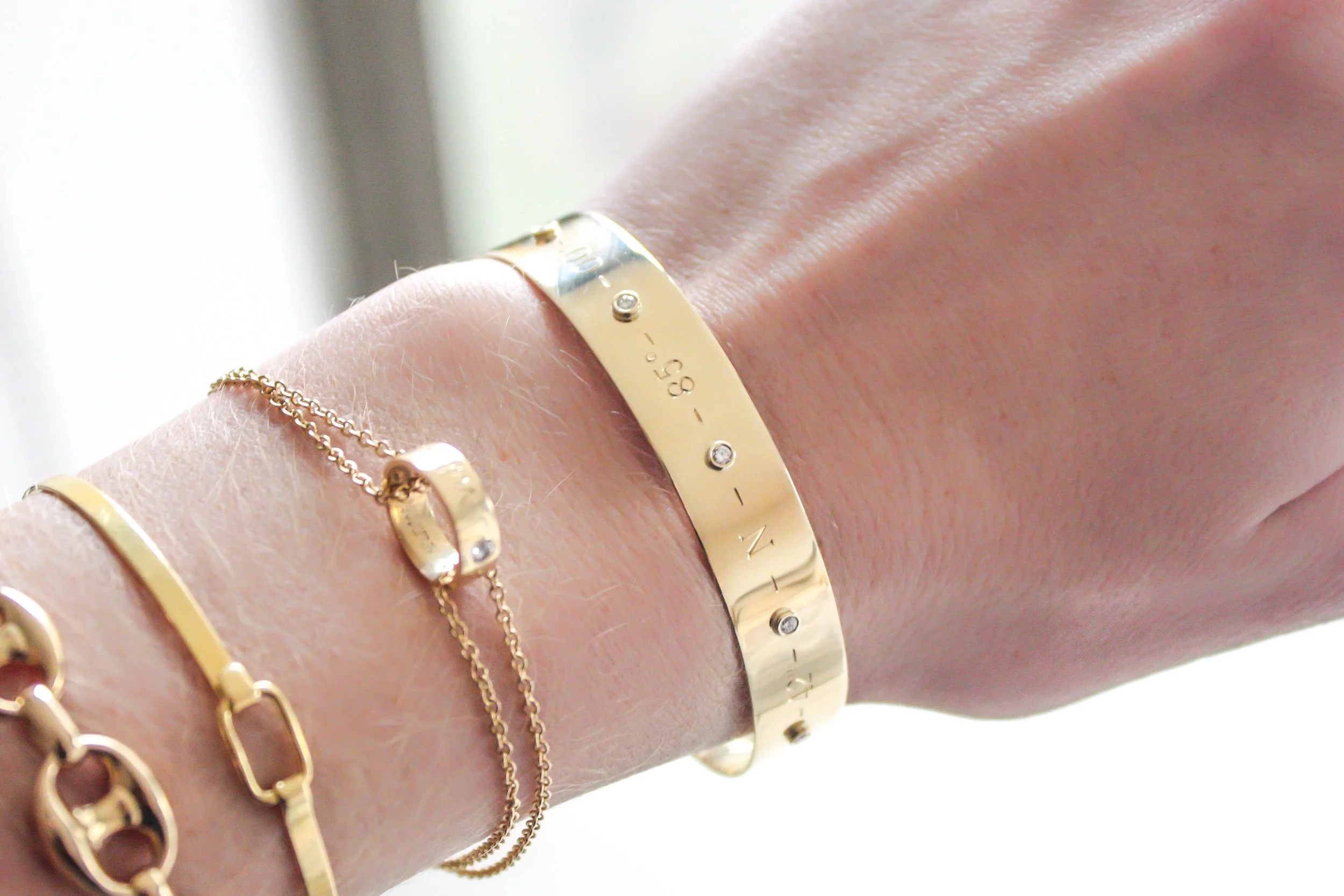 coordinates bangle by kerry gilligan 14k gold with diamonds.jpg