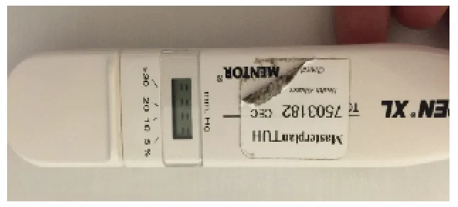 An example of the double rows of dashes indicating the tonopen is properly calibrated and ready to measure iop.