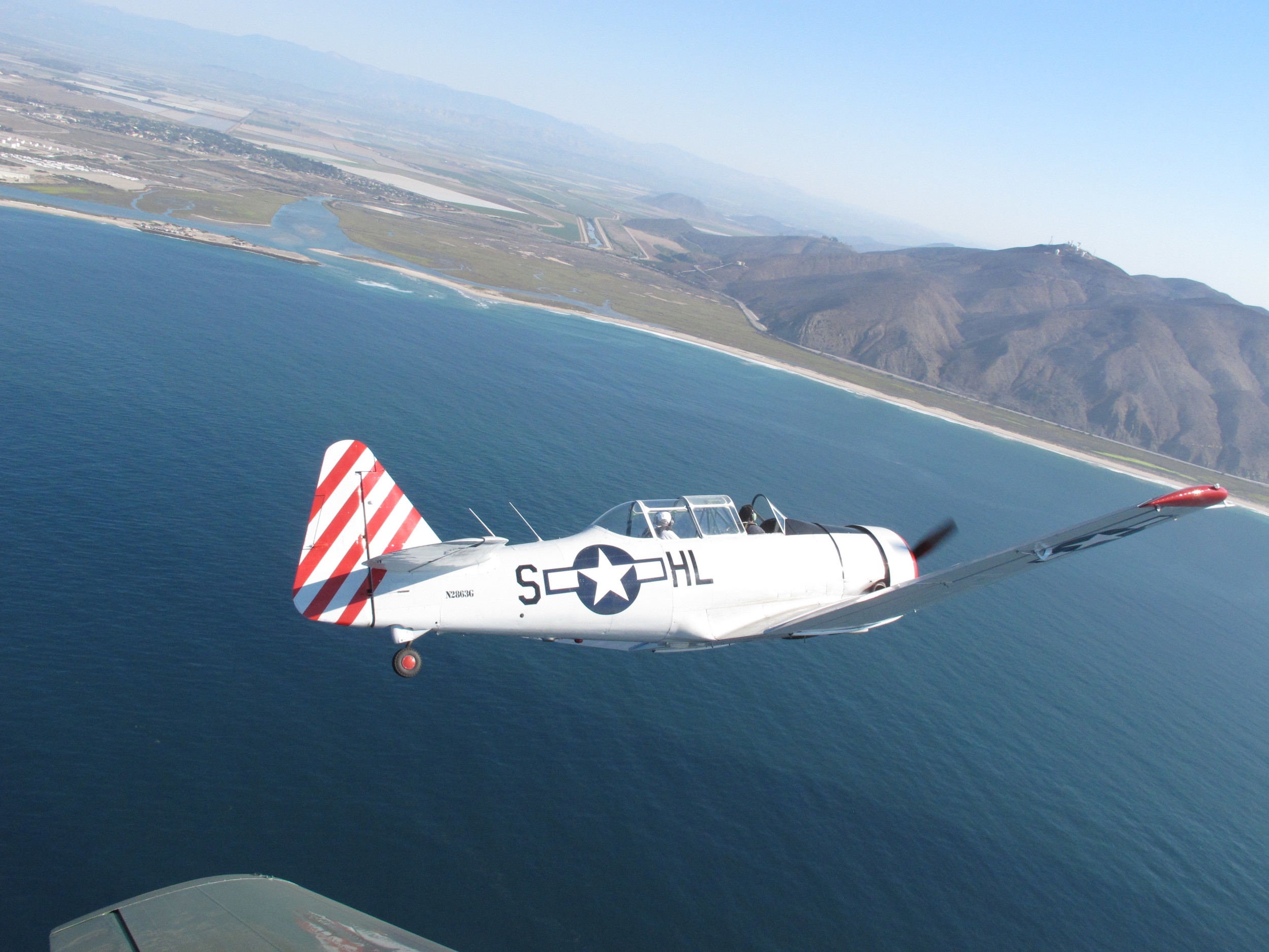  The Condors approaching for a flyover during the ceremony at NBVC - Pt. Mugu