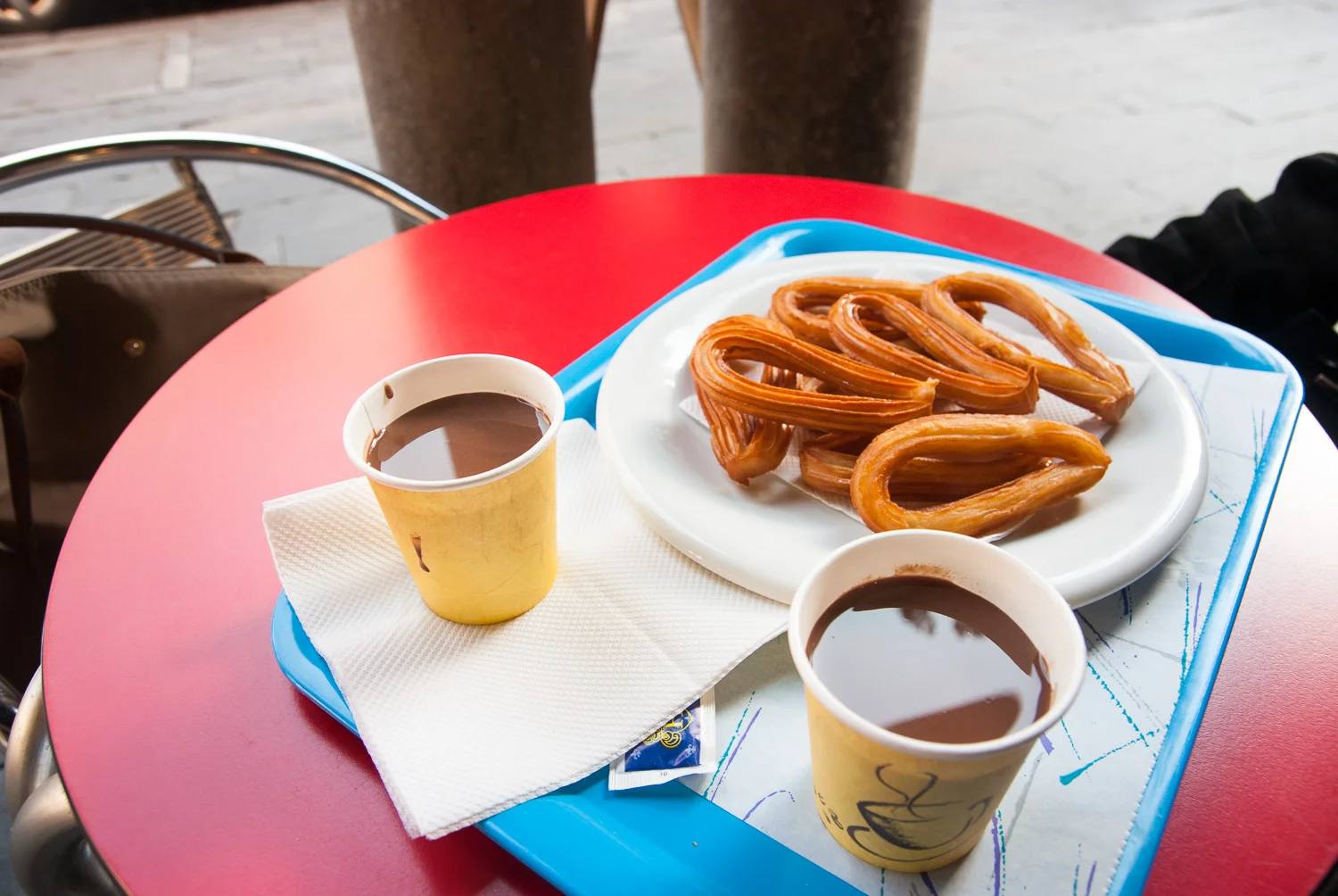  churros with chocolate dipping sauce