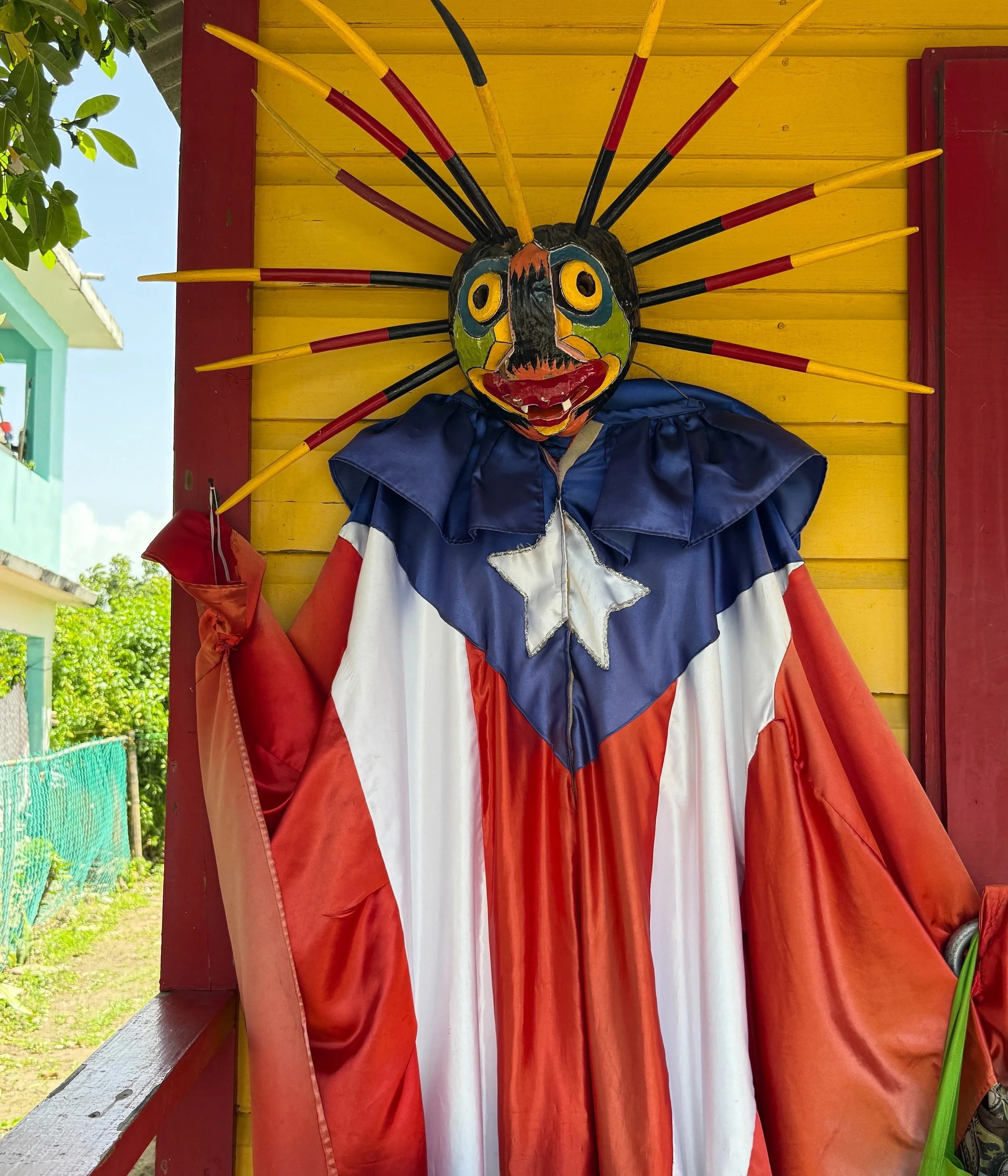 batey de los hermanos ayala loiza - boriken | puerto rico 2025 Vejigante masks from Puerto Rico are vibrant, hand-carved creations traditionally made from papier-mâché or coconut husks, featuring exaggerated horns, fangs, and vivid colors. They a