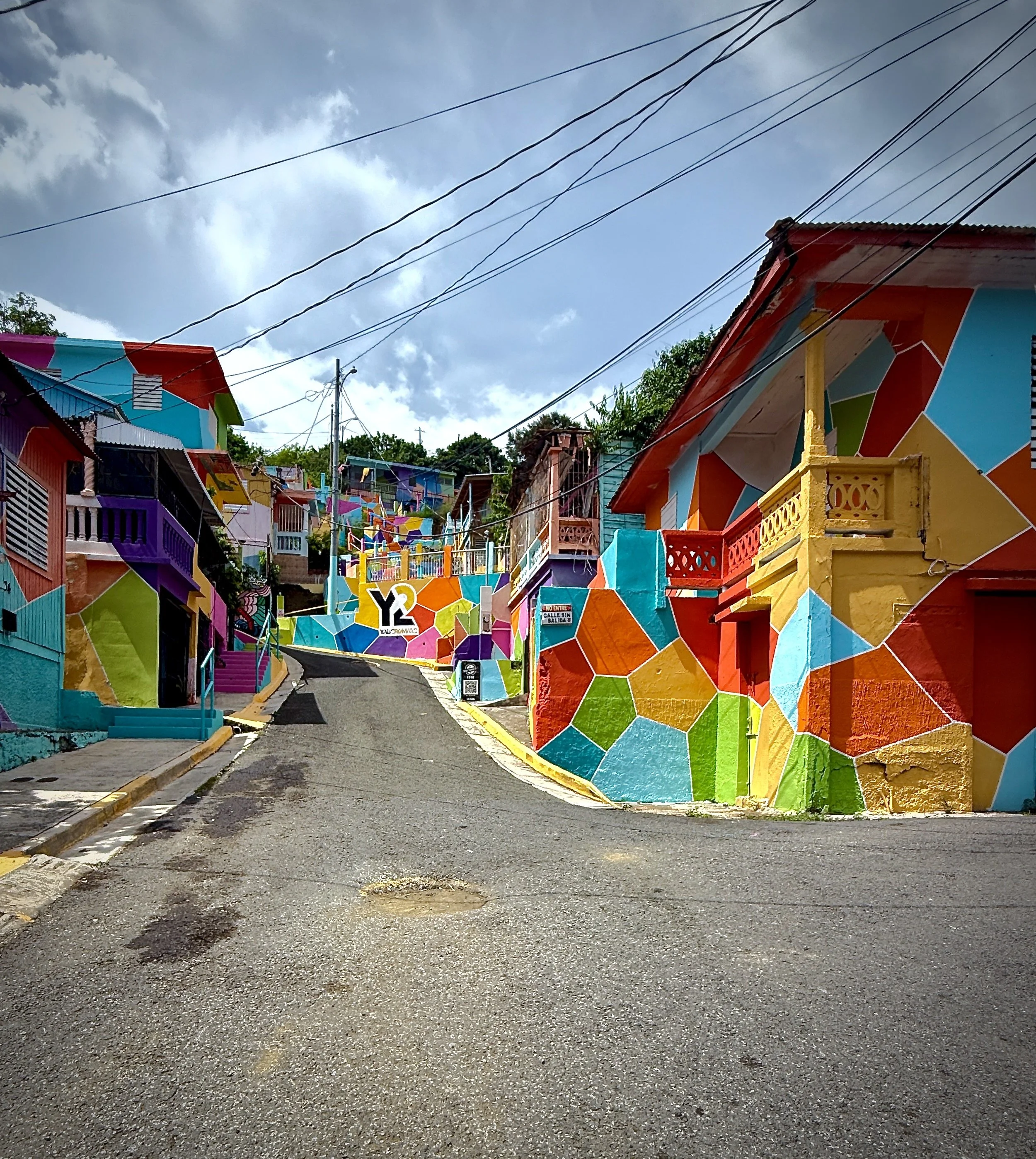 yauco boriken | puerto rico 2025 Yaucromatic, launched in 2017 in Yauco, Puerto Rico by Arte Para Unir and community activist Jonathan “Pito” Hernández, transforms the town’s streets into a vibrant open-air gallery of murals. Guided by the princi