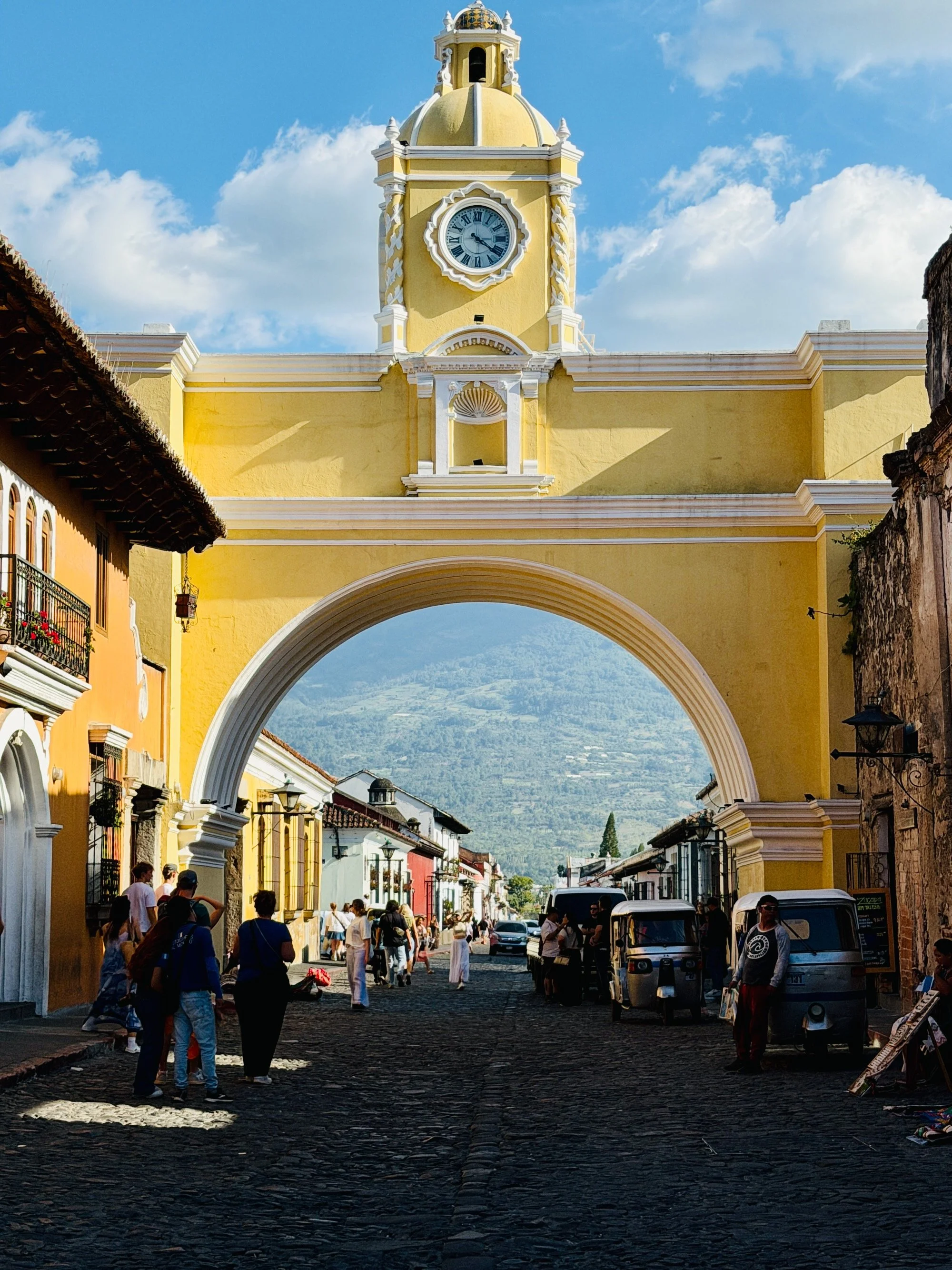  arco de santa catalina  la antigua | guatemala  2026  A yellow arch built in the 17th century so cloistered nuns from the Santa Catalina convent could cross the street without being seen by the public. 