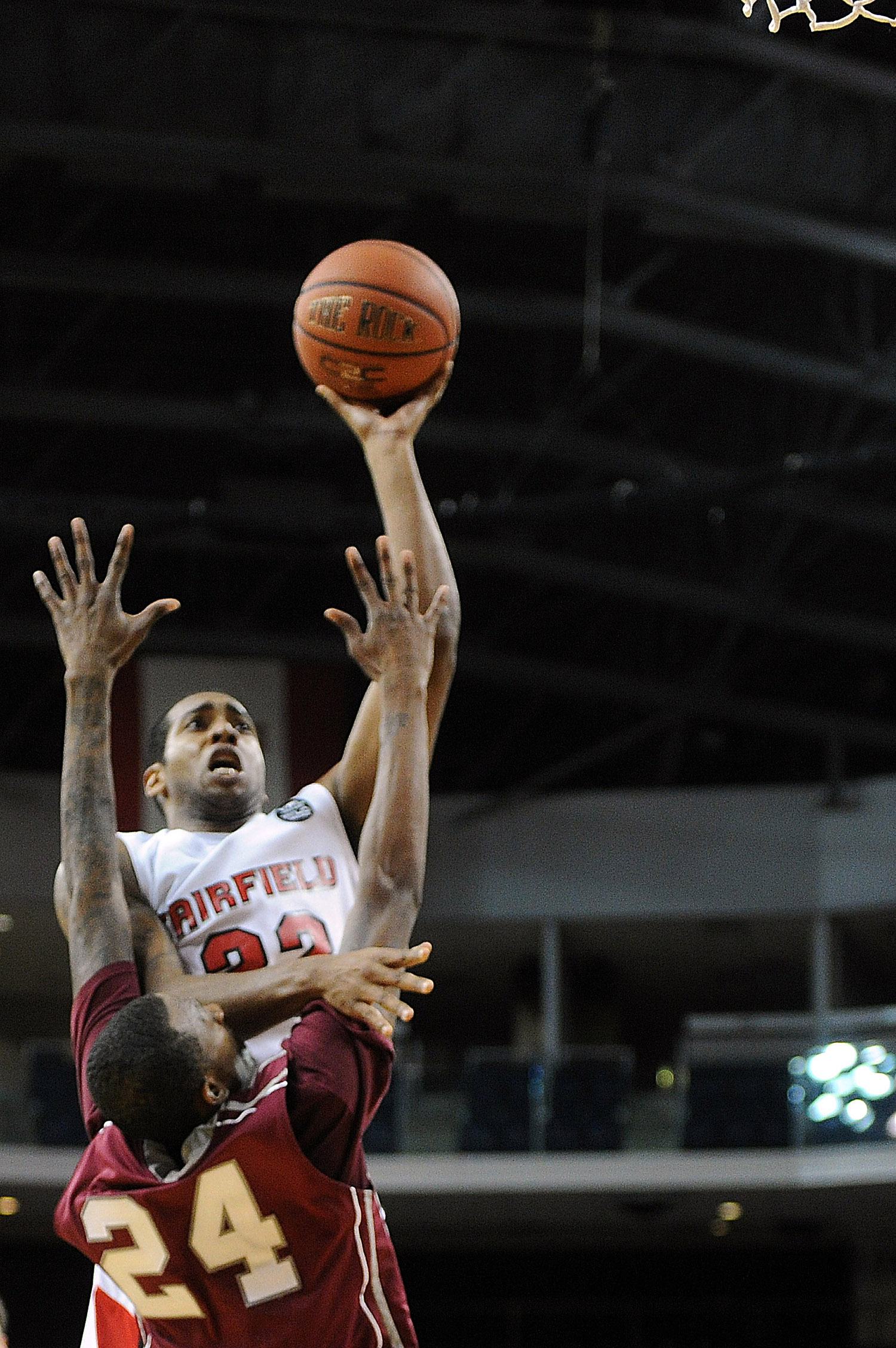  Fairfield University's Warren Edney scores two points during the game against St. Joseph University at the Arena at Harbor Yard on November 23, 2010. 