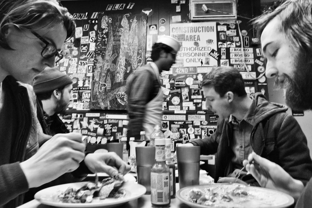 Doubting Thomas Cruise Control eats a pre-show meal at the Bushwick Pita Palace in Bushwick, Brooklyn 