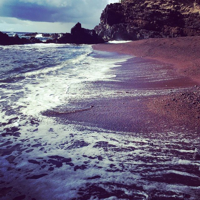 The Red Sand Beach in Hana isn't so much sand as it is little rocks with a reddish tint. Definitely a climb to get here too, scrambling over rocks and hiking around sharp cliffs. I actually bruised my hands from a short fall I took climbing around the rocks.
