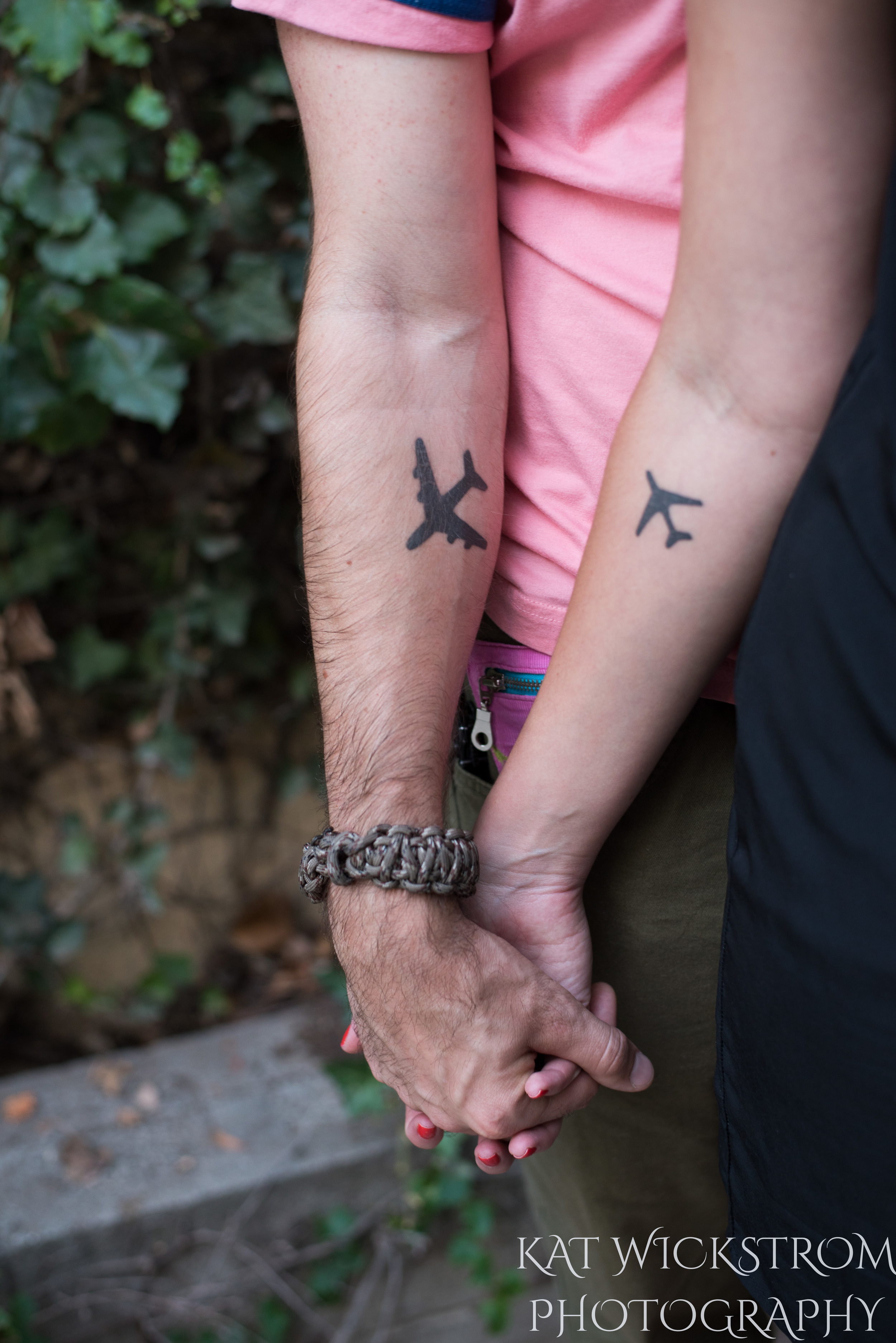 They both got matching tattoos recently of airplanes. This is a representation of their desire to travel the world together.