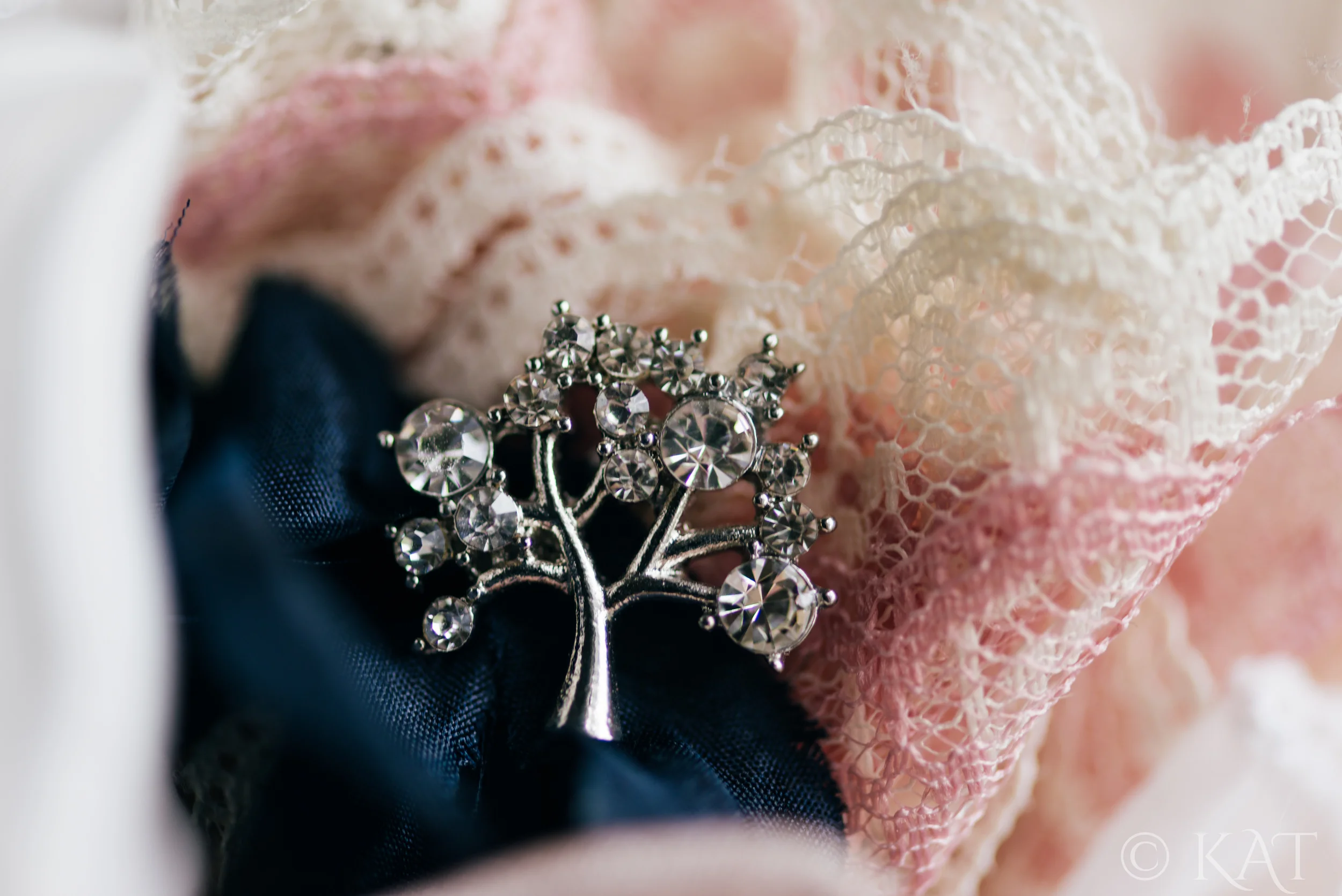 Here's one of the pins we added to the bouquet. I love this tree detail!