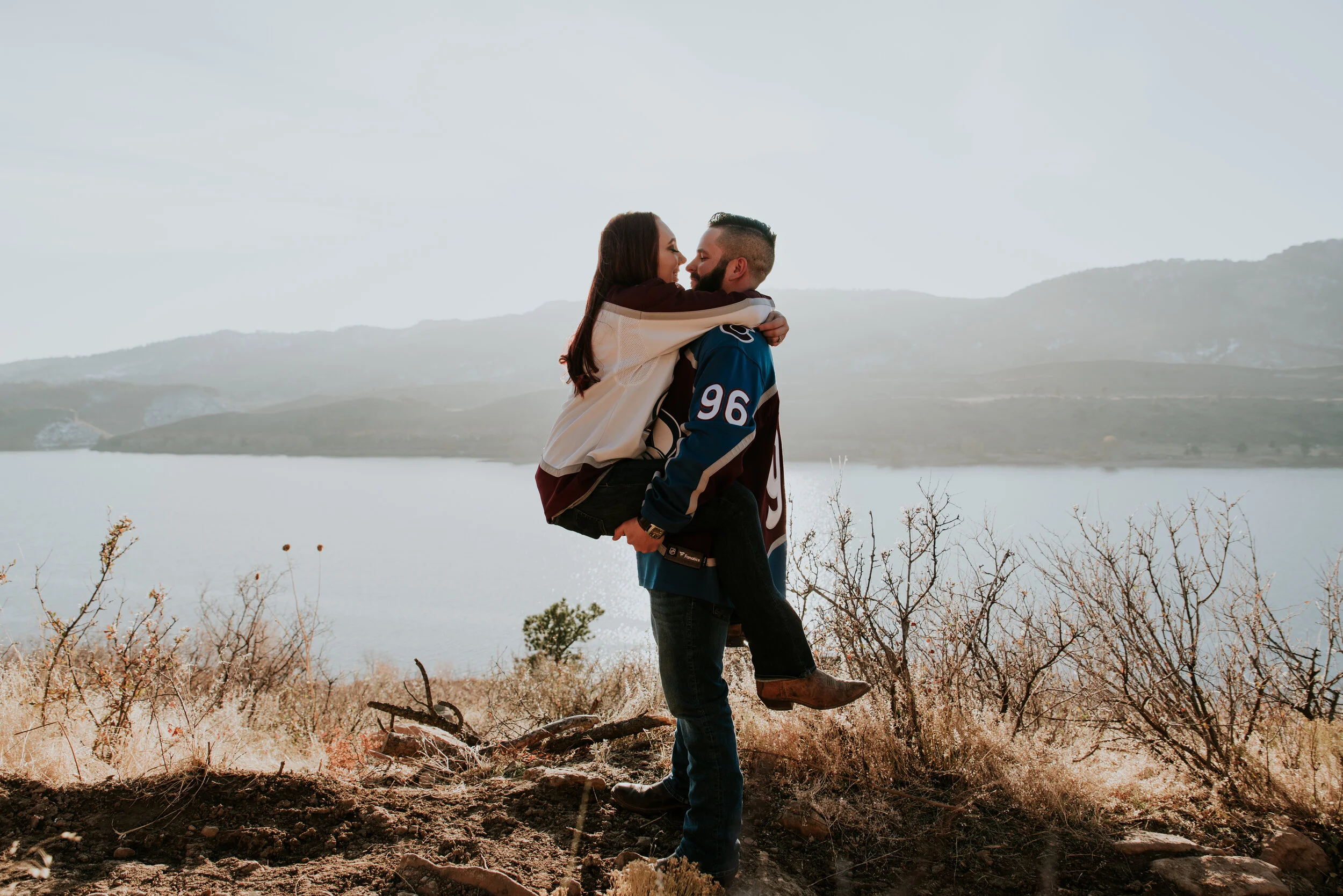 couple-embraces-at-horsetooth-reservoir-photo-session