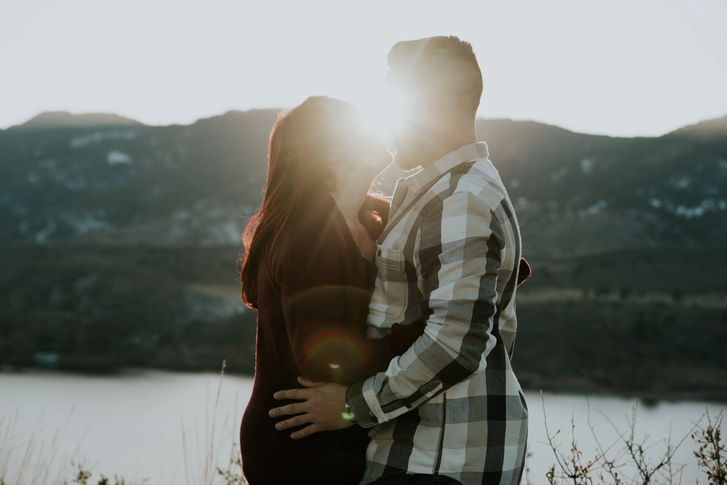 couple-kisses-at-sunset-near-horsetooth-reservoir