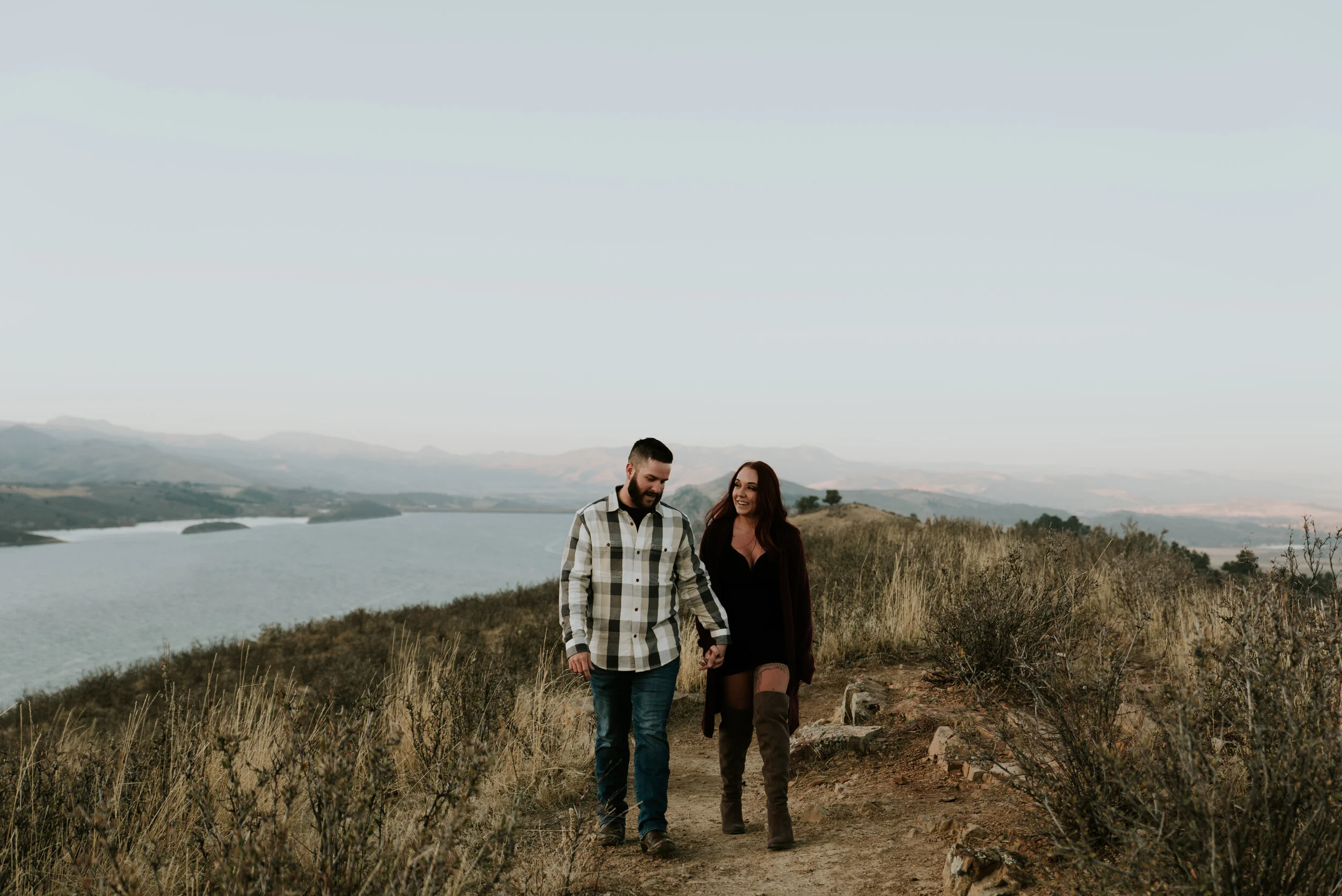 couple-walking-on-mountain-trail-at-horsetooth-reservoir