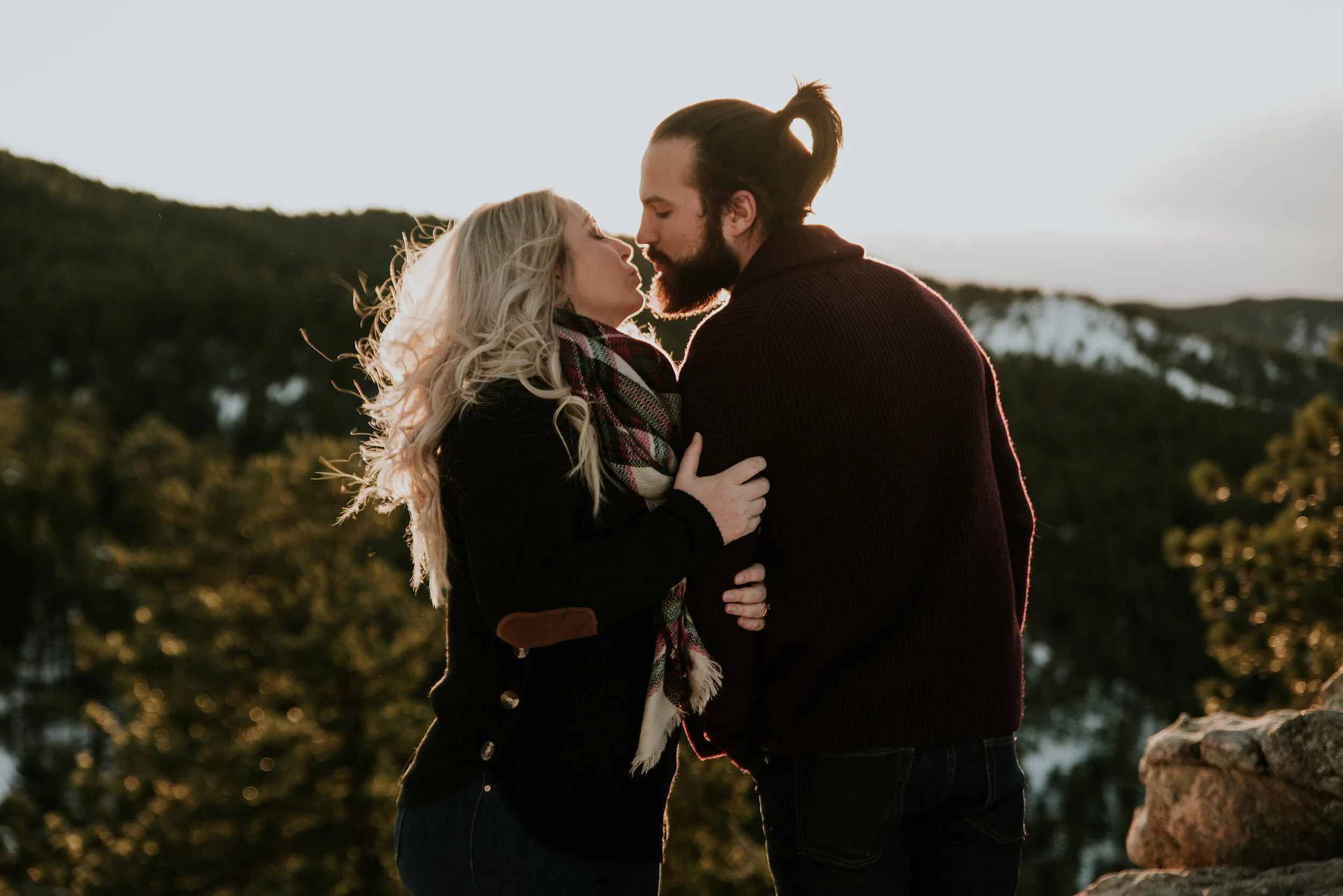 couple-kisses-during-engagement-session-at-lost-gulch