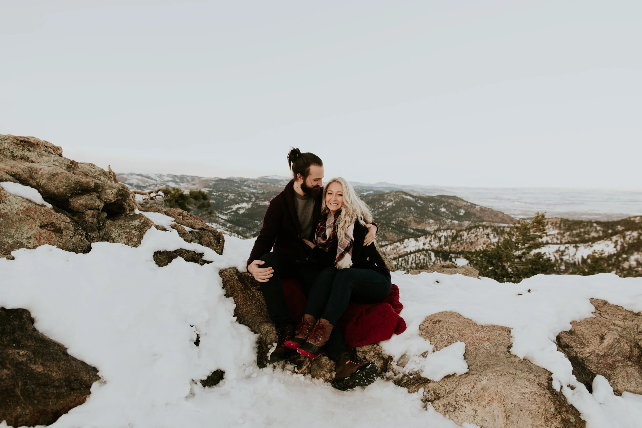 couple-sits-on-mountain-at-lost-gulch