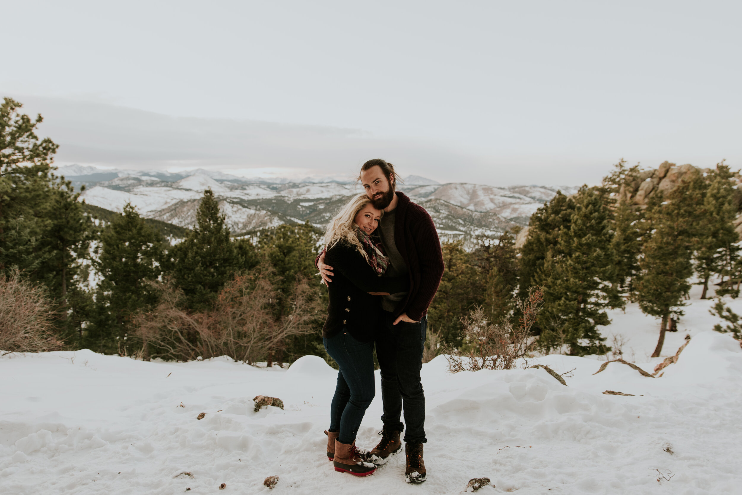 couple-poses-in-mountains-during-engagement-session