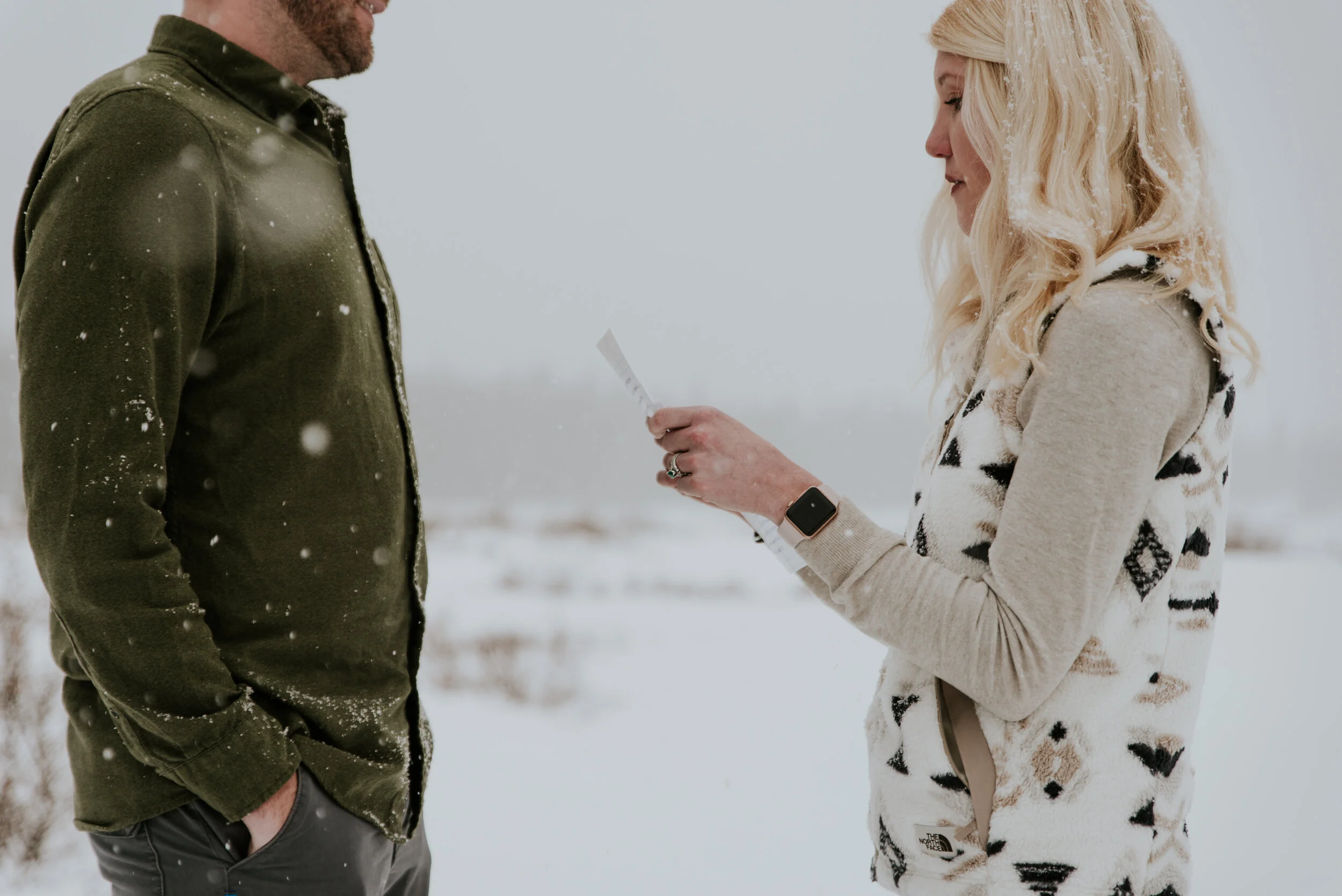 sharing-vows-in-the-snow-on-a-lake