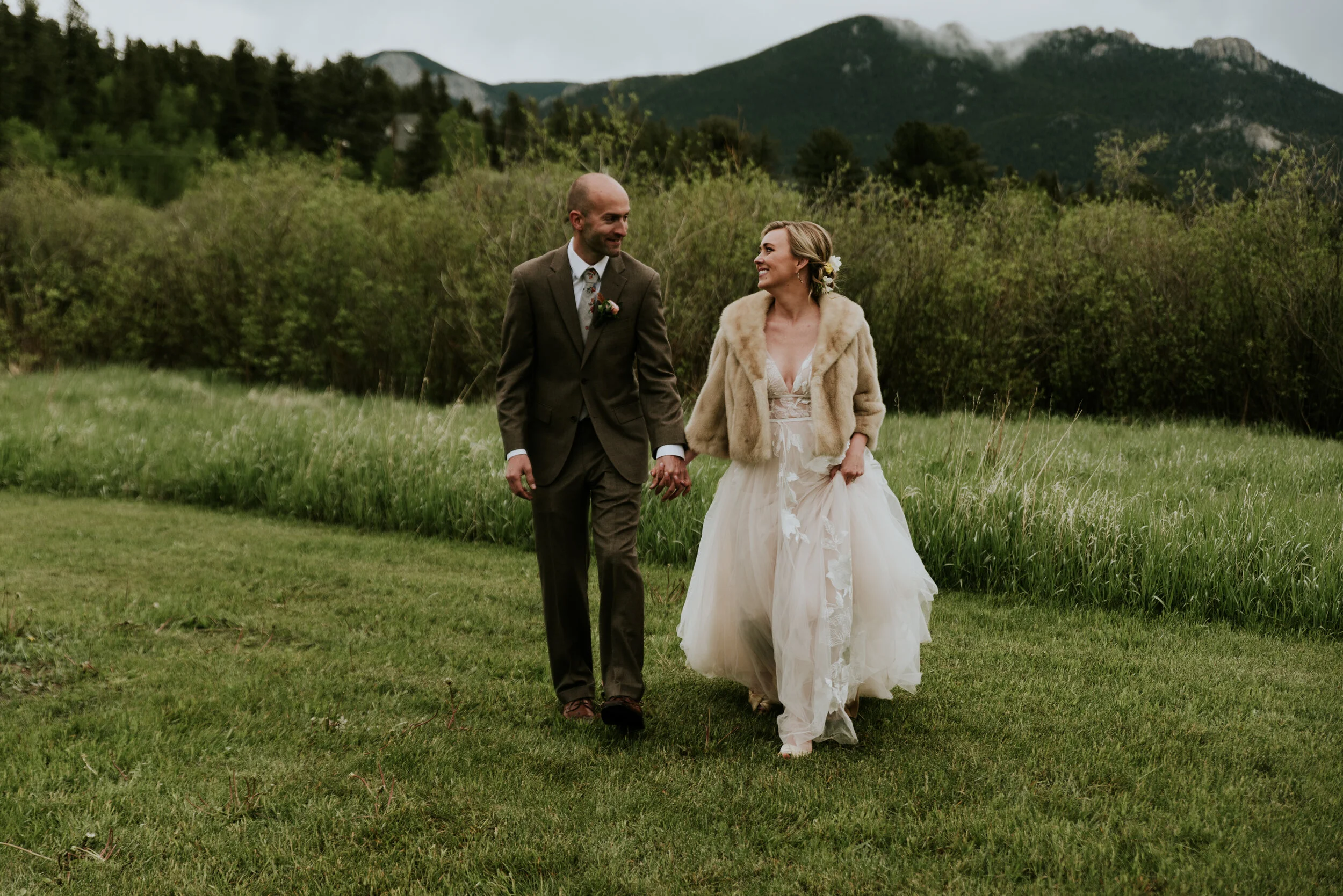 A bride and groom enjoy their destination elopement in the mountains after reading the 7 step guide to planning your destination wedding or elopement