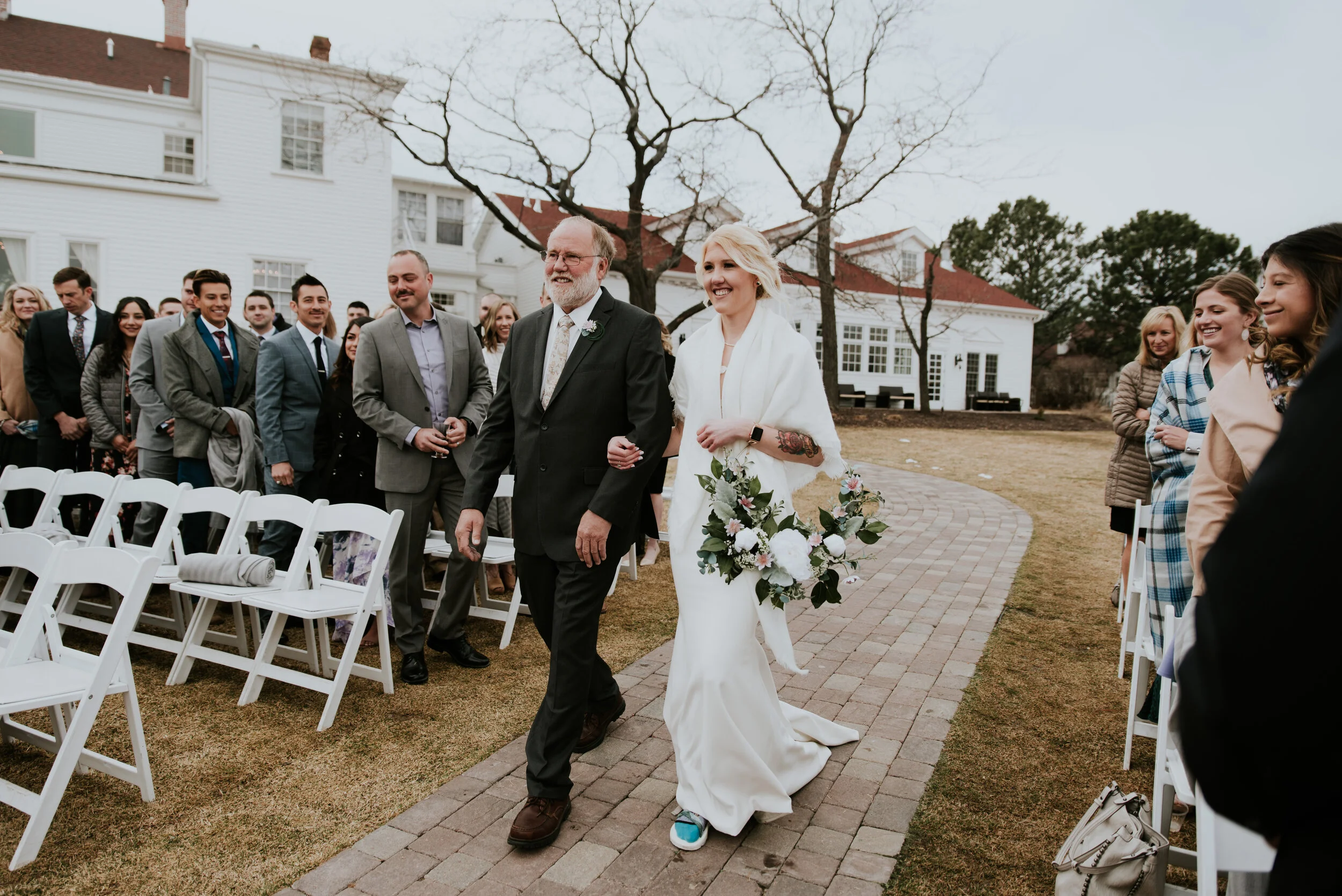 bride-down-aisle-manor-house