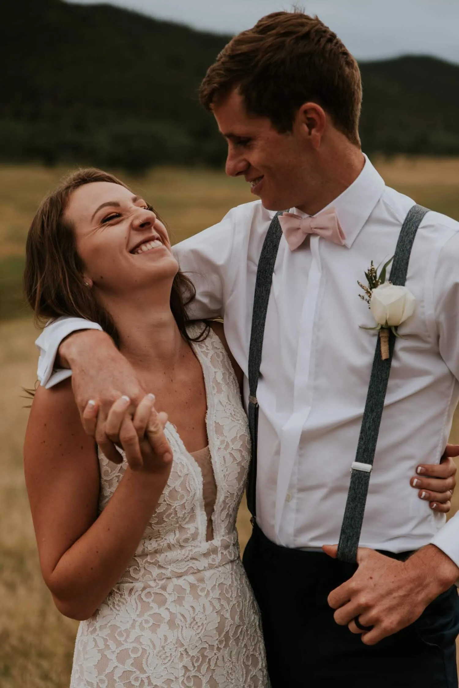 A couple embracing during a destination elopement in Colorado with Kat Wickstrom Photography, a destination wedding elopement photographer