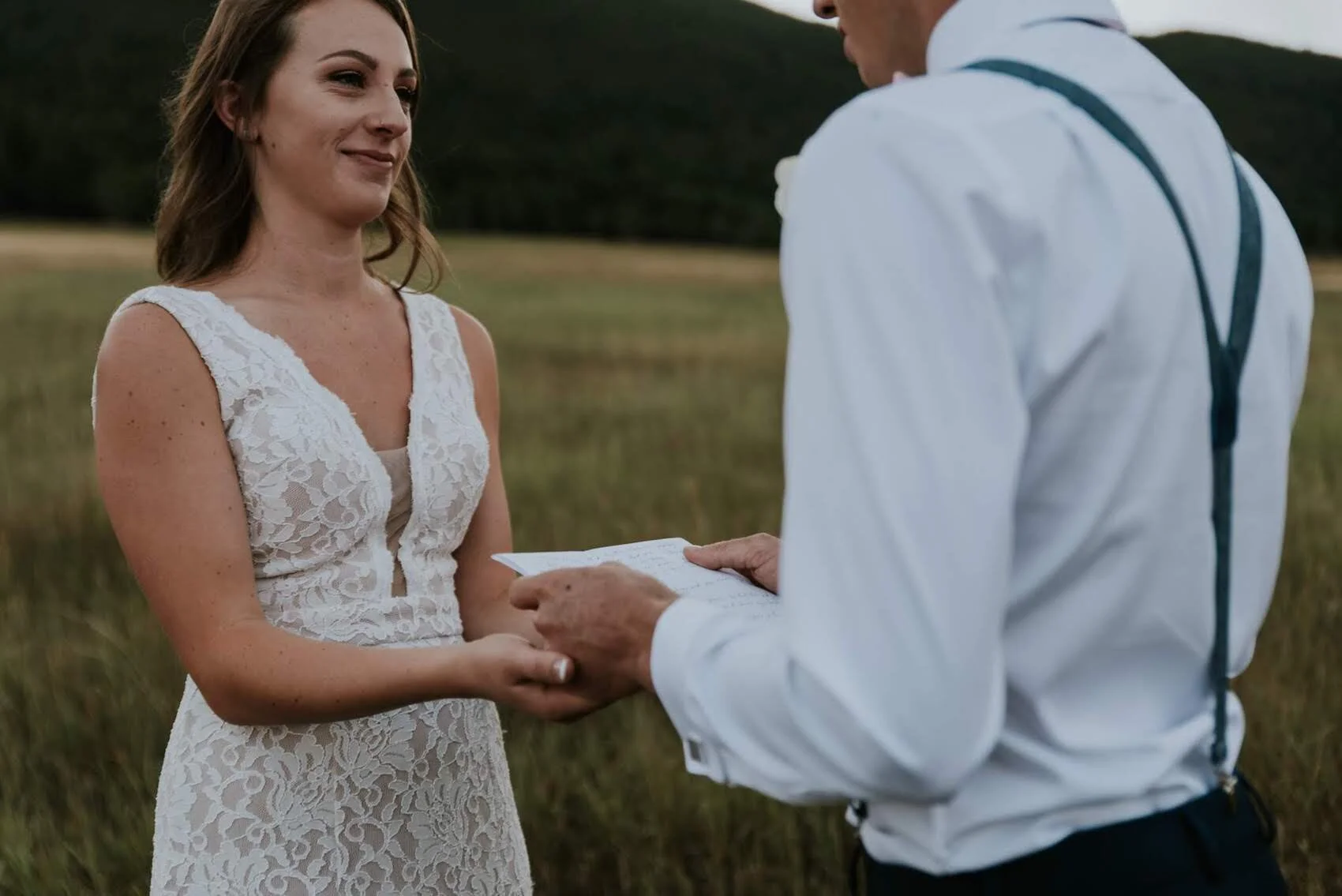 A couple exchanging vows in a Colorado mountain elopement
