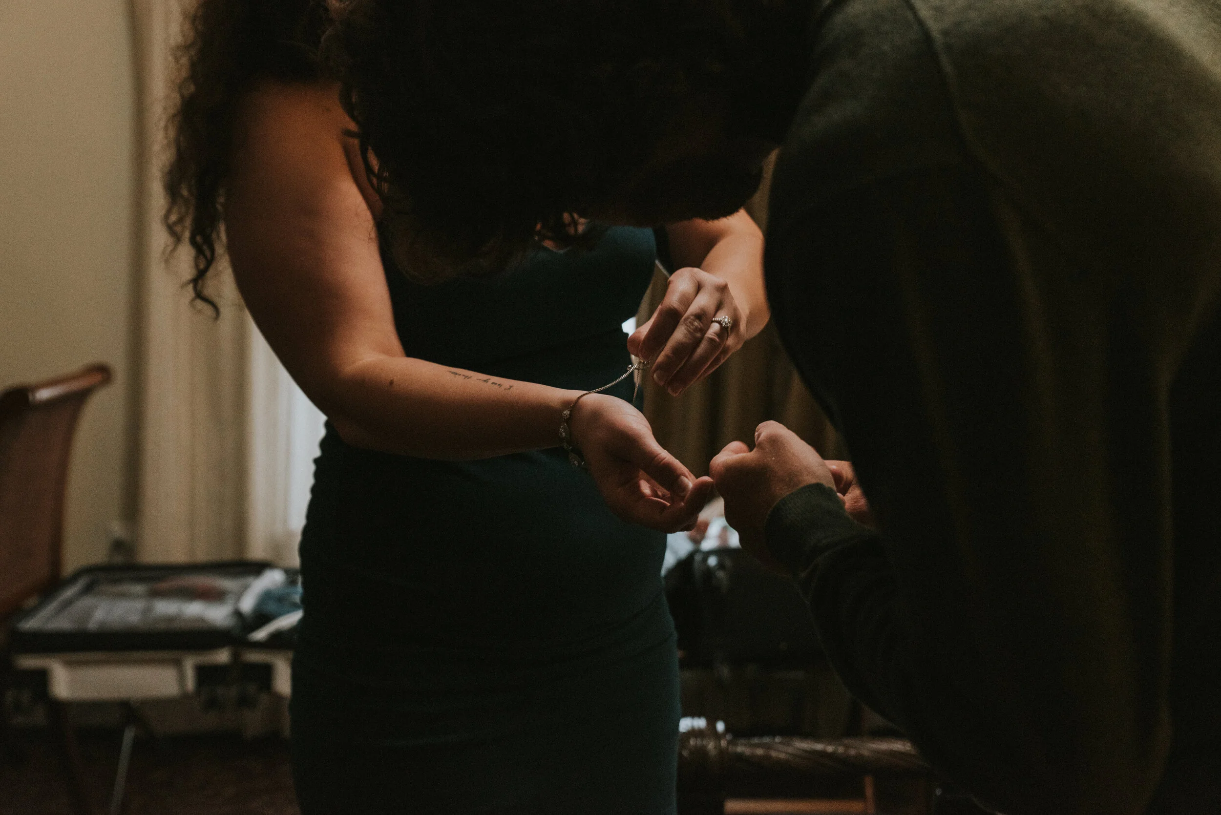 a_couple_gets_ready_during_mountain_engagement