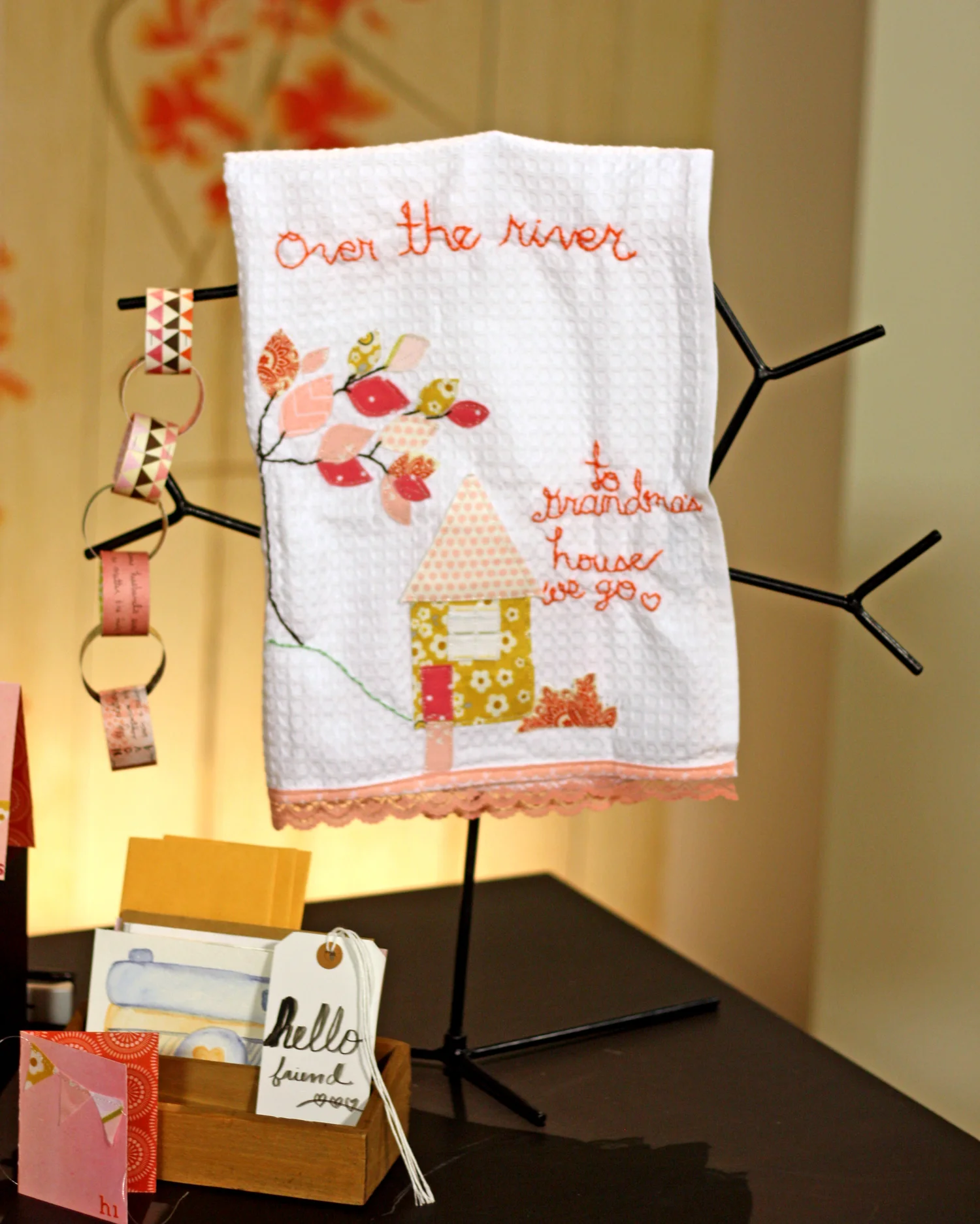 Yeah, this is supposed to say "Over the river and through the woods, to Grandmother's house we go." BUT, I ran out of orange embroidery floss, so it's partially complete at the moment. And I ran out of room for "Grandmother's." so "Grandma's" will have to do. :-/