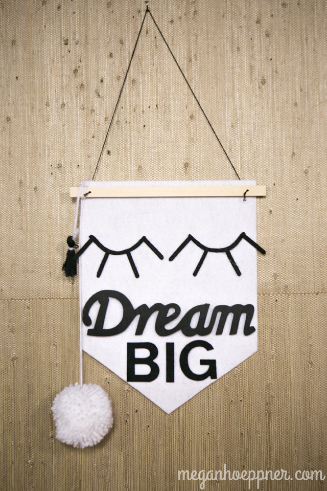 I made this shield using stiff felt sheets and felt letter stickers, all purchased at Michaels. The "Dream" is a wood piece that I spray painted black. It, too, is from Michaels.