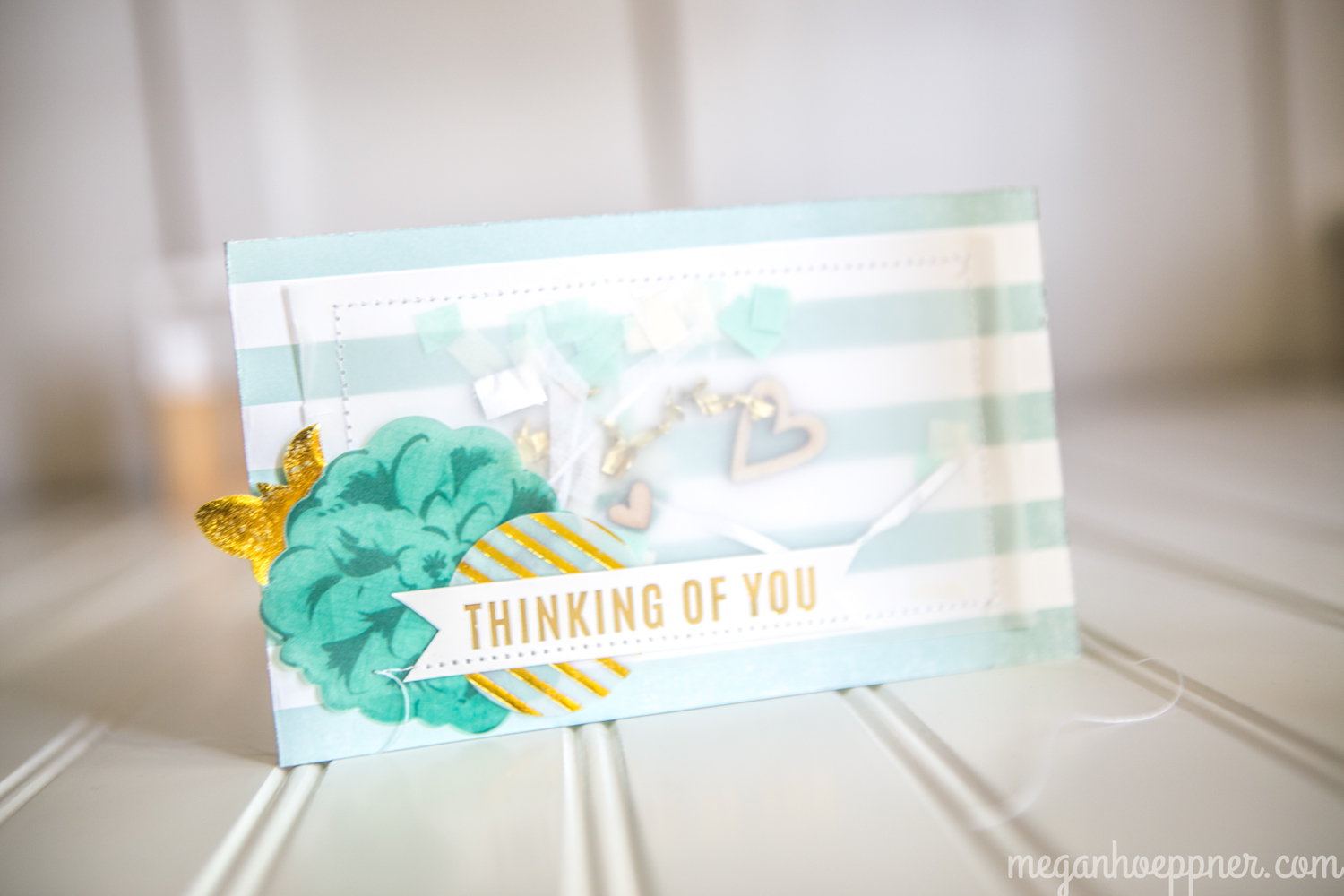 supplies: PAPER: Echo Park Paper; VELLUM: Stampin' Up!; "Thinking of You" STRIP, VELLUM ACCENTS: Maggie Holmes for Crate Paper; WOOD HEARTS: ummmm... I think they're Freckled Fawn.