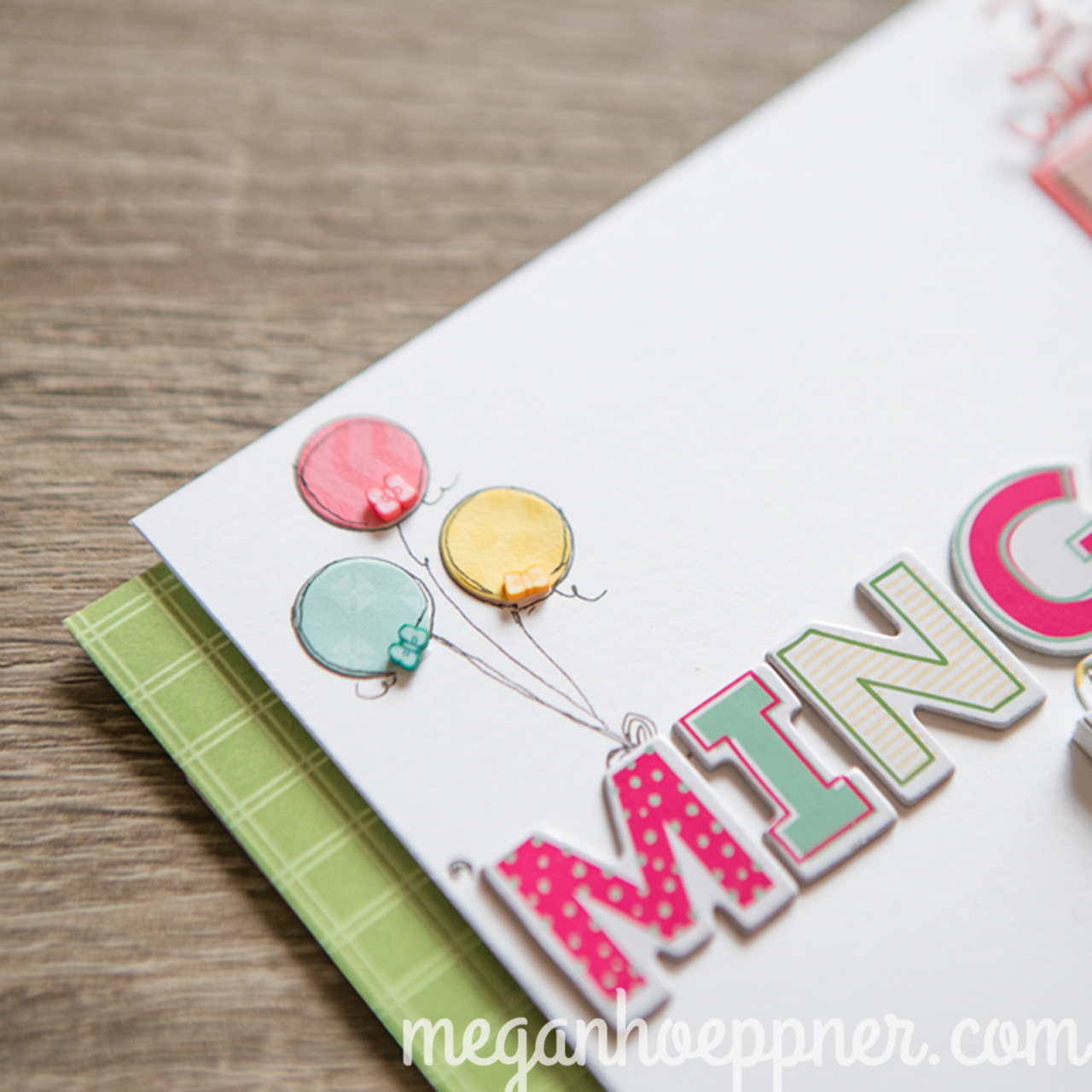The "leftover" that remain following a die cutting session can be put to use in other fun ways. These circles from the presents I cut made quick and cute balloons on the page. I outlined them with pen and added some detail to complete the look. Including those dang cute Queen & Co. bows! 