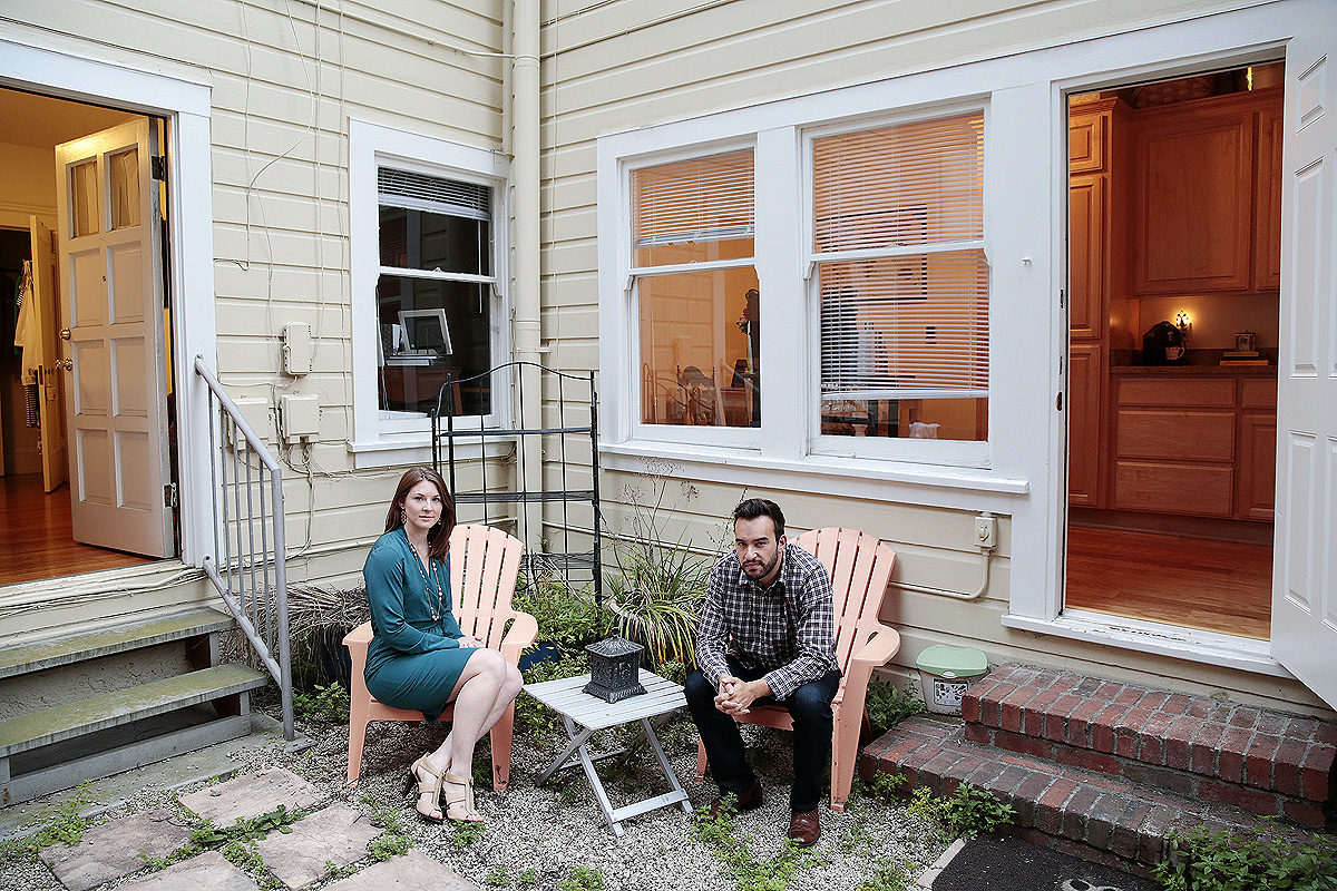 Jossi and Meg Cruz pose for a portrait at their 1000 square foot apartment in San Francisco, California, on Thursday, August 28, 2014. Meg and her husband just got married in May and work with two financial services/advisors. They signed up for learn vest when they got engaged for help budgeting and also work with Chantel Bonneau, an advisor with Northwestern Mutual for insurance needs, benefits advice, retirement planning, etc. Read more here .