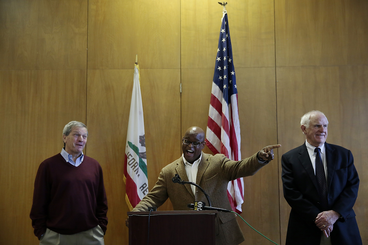 Congressman Mark DeSaulnier, left, Tim Jones, the Executive Director of the Richmond Housing Authority, and Richmond Mayor Tom Butt, during a press conference at Hacienda housing complex in Richmond, California, Friday, February 6, 2015. Today it was announced that current residents of the Richmond Housing Authority owned and maintained complex would receive Section 8 vouchers to find housing as the housing complex is renovated and long-standing problems with the building are addressed. 